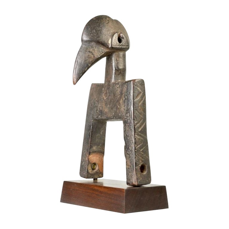 Heavily used Senufo Pulley with Hornbill Finial in Wood For Sale