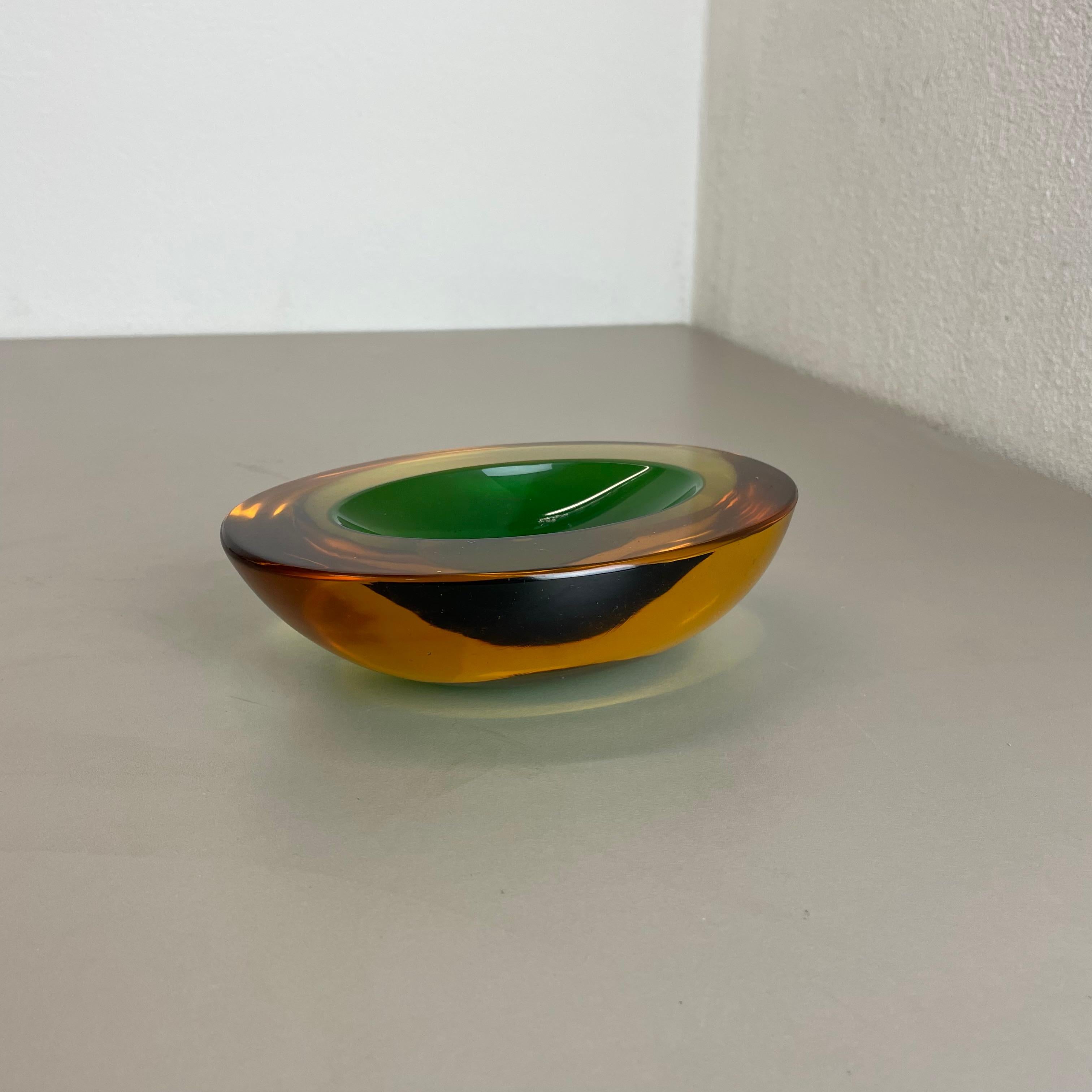 Article:

murano glass bowl, ashtray element.


Origin:

Murano, Italy.


Decade:

1970s.



This original vintage glass bowl element, ash tray was produced in the 1970s in Murano, Italy. It is made in Murano technique and has a fantastic form. The