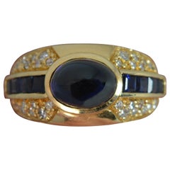 Heavy 18 Carat Gold Sapphire Cabochon and Diamond Cluster Ring