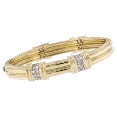 Brazalete pesado de oro amarillo de 18 quilates con cuatro estaciones de diamantes de 0,50 qt