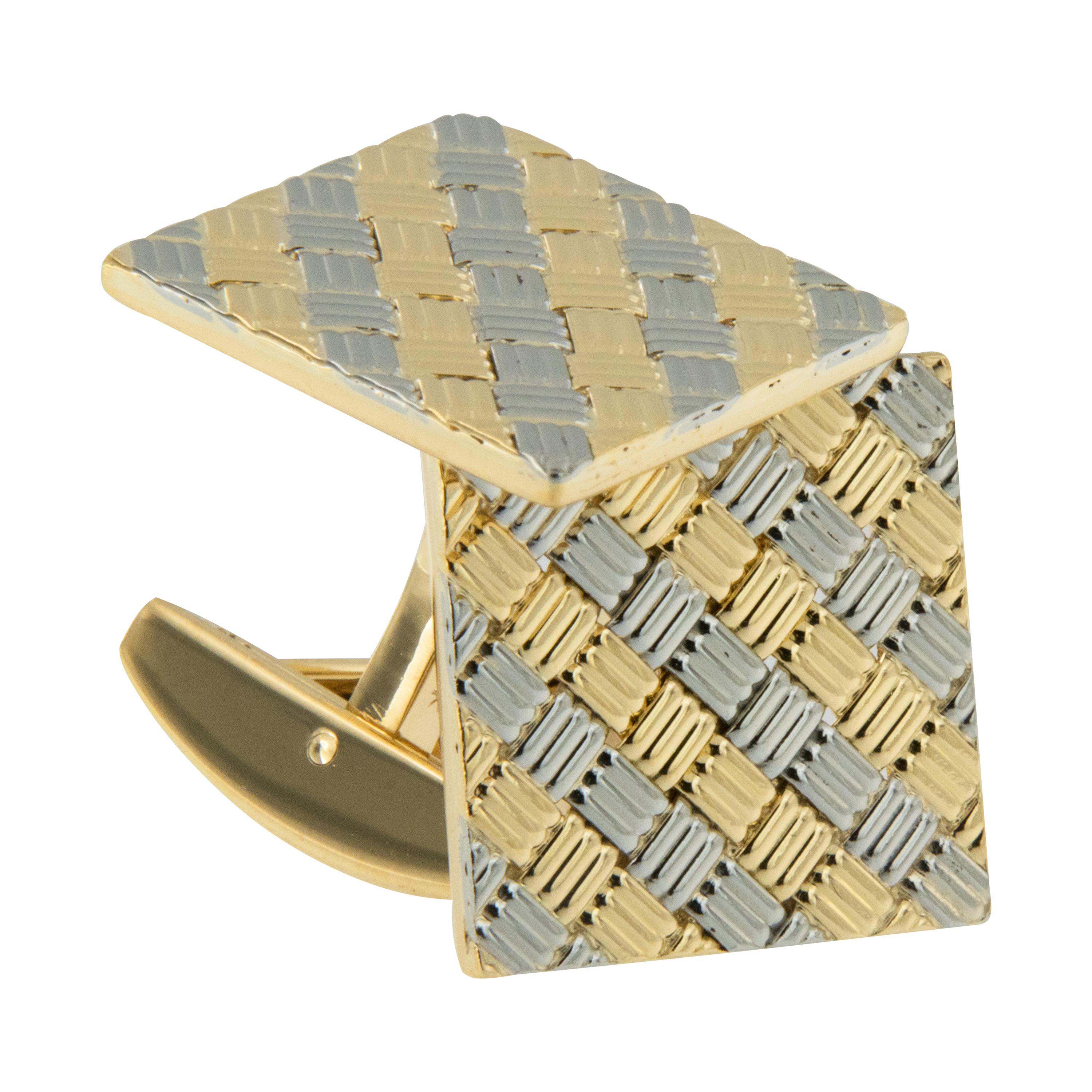 For the consummate, stylish man we offer these handsome & classic cufflinks ! Handmade by Schubot Jewelers, these new, old stock pieces with alternating 18 karat  yellow & white gold in stylized woven fashion will set off any shirt. Sturdy, curved