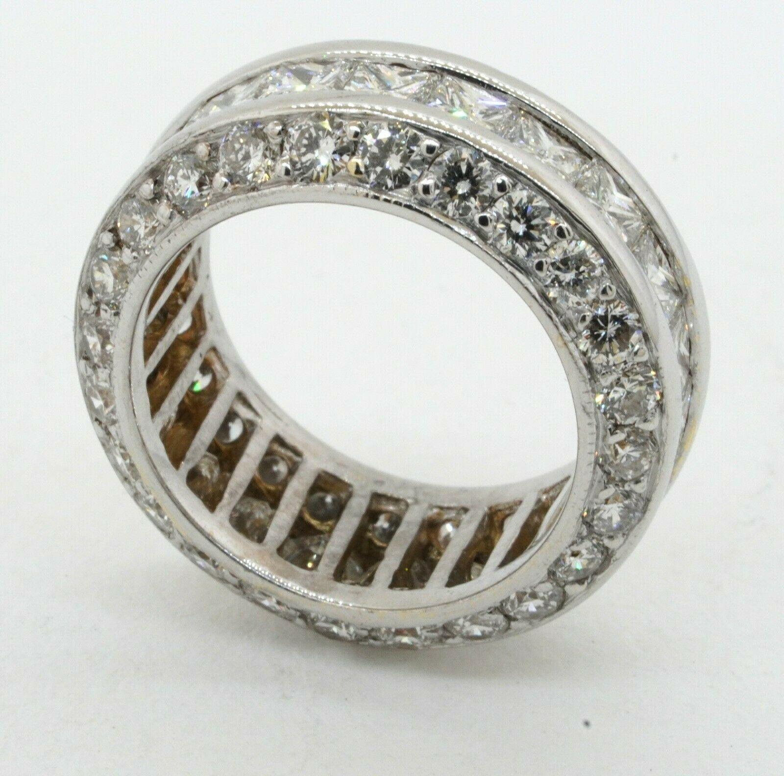 Heavy 18K white gold 5.88CT VS diamond cluster thick eternity band ring size 4.5. This fashionable piece of jewelry is crafted in beautiful 18K white gold and features multiple diamonds (Excellent VS1 - Above Average SI1 clarity/Colorless F - G