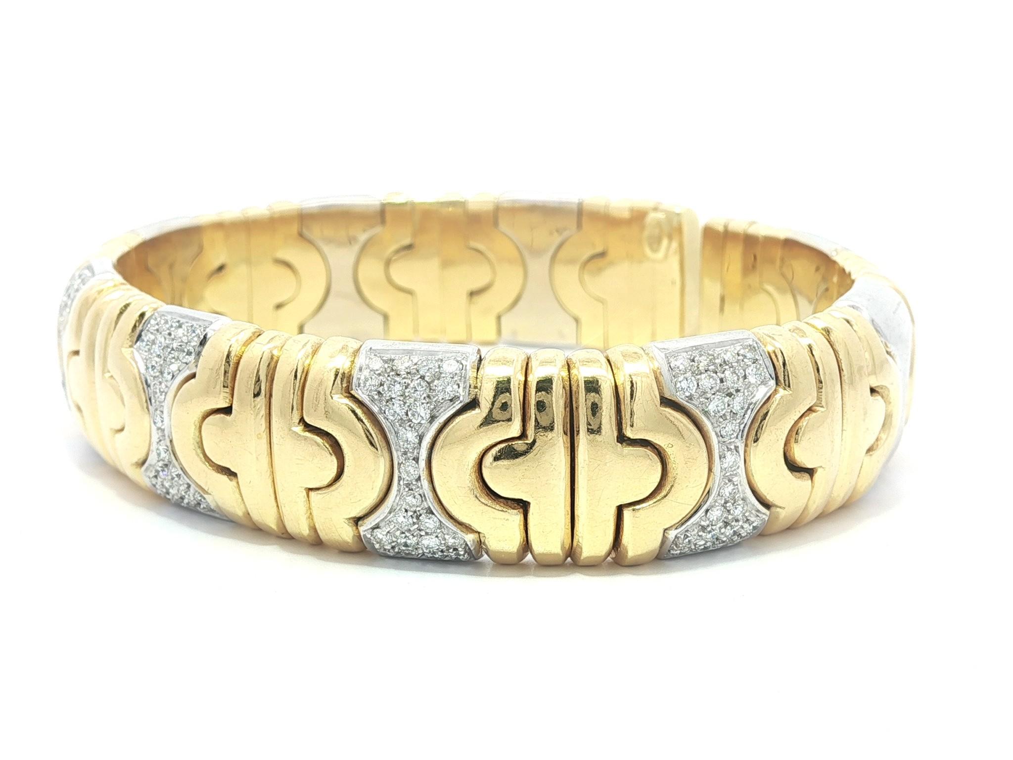 --Pietre: --
115 diamanti naturali autentici - taglio rotondo a brillante - incastonati - bei diamanti bianchi a brillante - 1,0ctw circa.

Materiale: Oro giallo e bianco massiccio 18k
Peso: 72,97 grammi
Lunghezza: Flessibile, si adatta a un polso