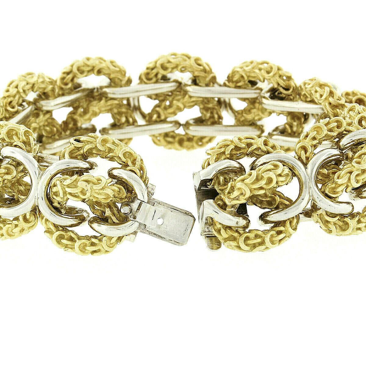 Women's Heavy 18 Karat Yellow and White Gold Wide 3D Infinity Knot Chain Bracelet For Sale