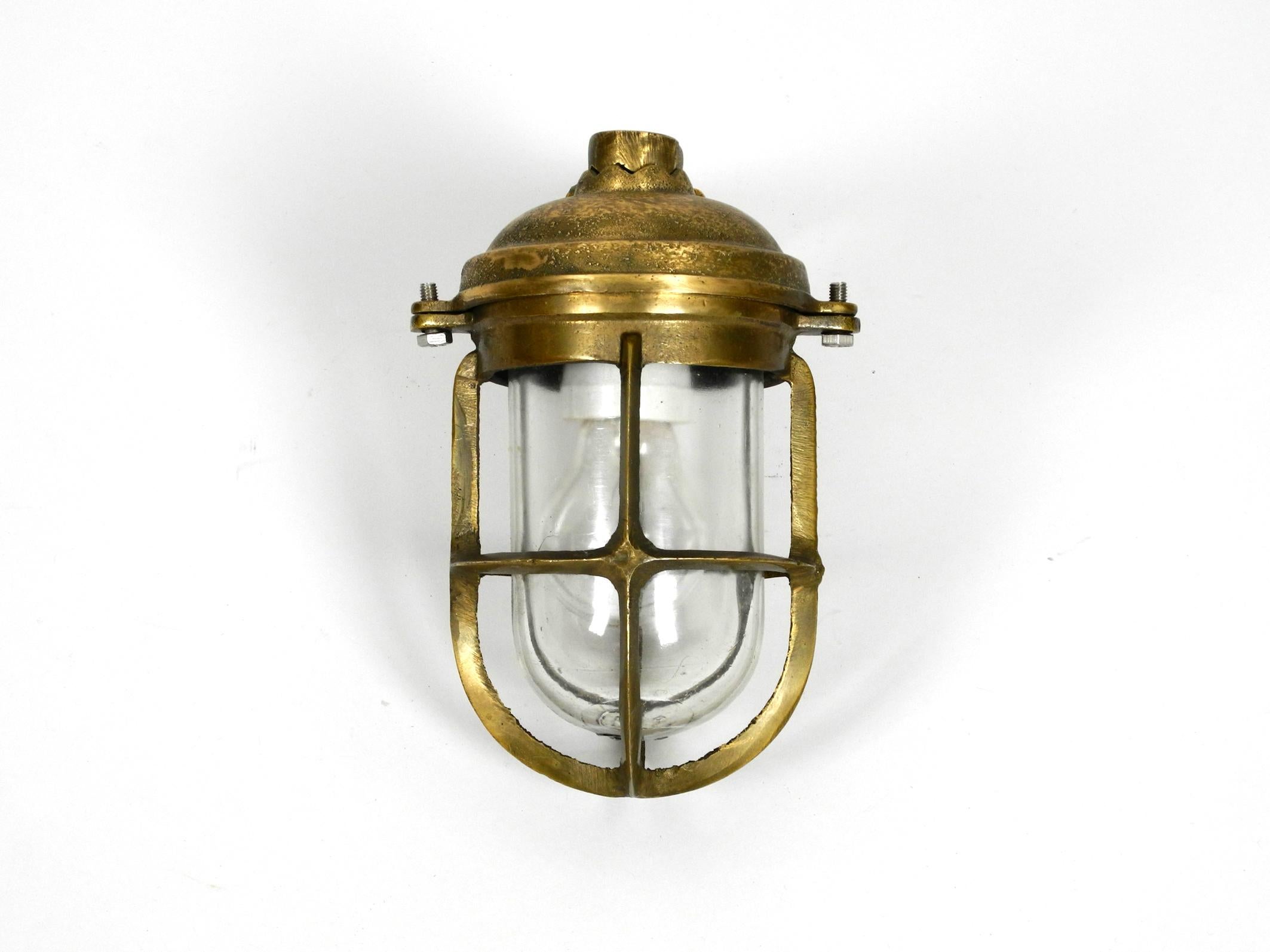 European Heavy 1950s Maritime Ship Wall Lamp Made of Cast Brass and with Glass Shade For Sale