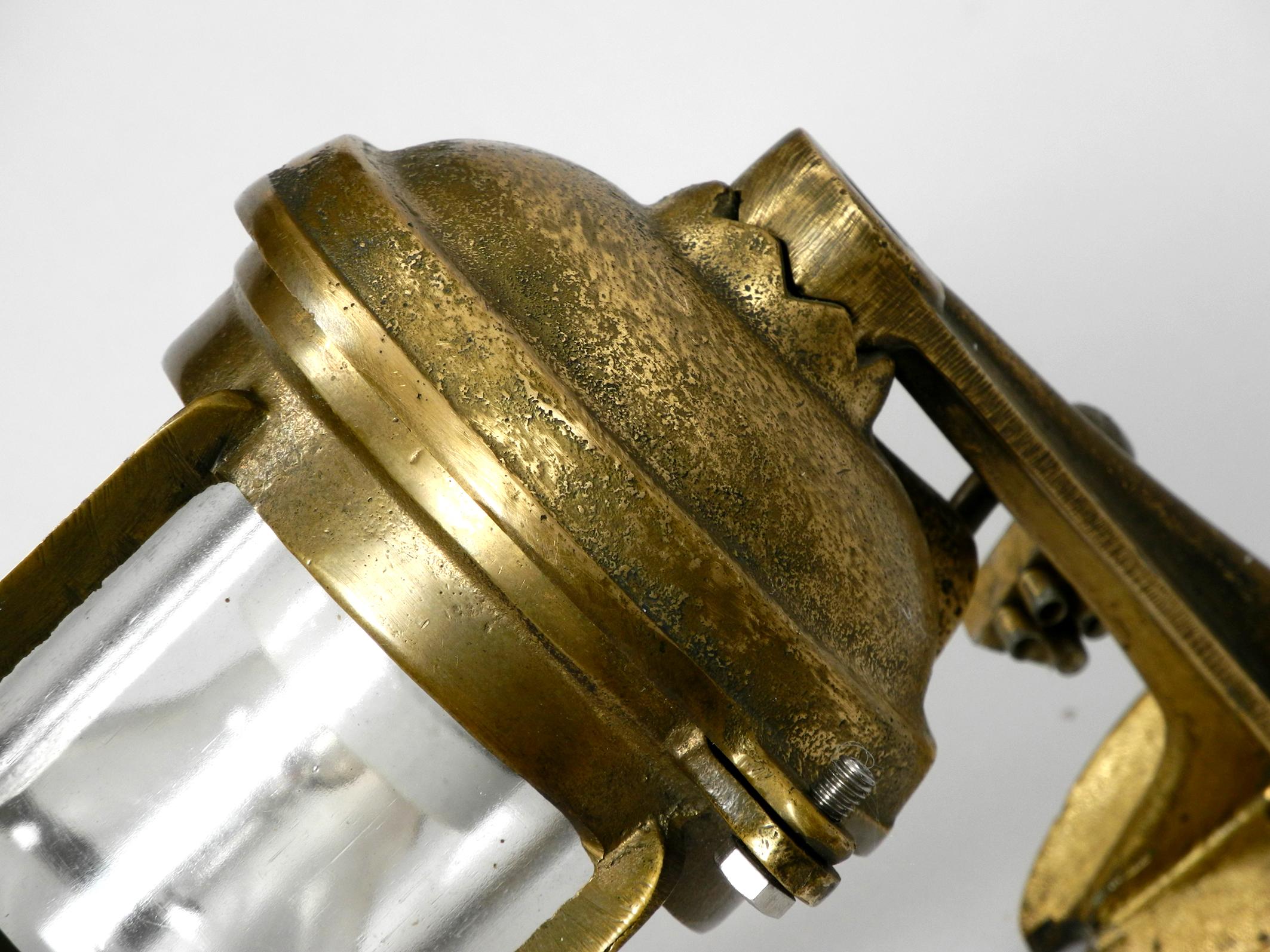 Mid-20th Century Heavy 1950s Maritime Ship Wall Lamp Made of Cast Brass and with Glass Shade For Sale