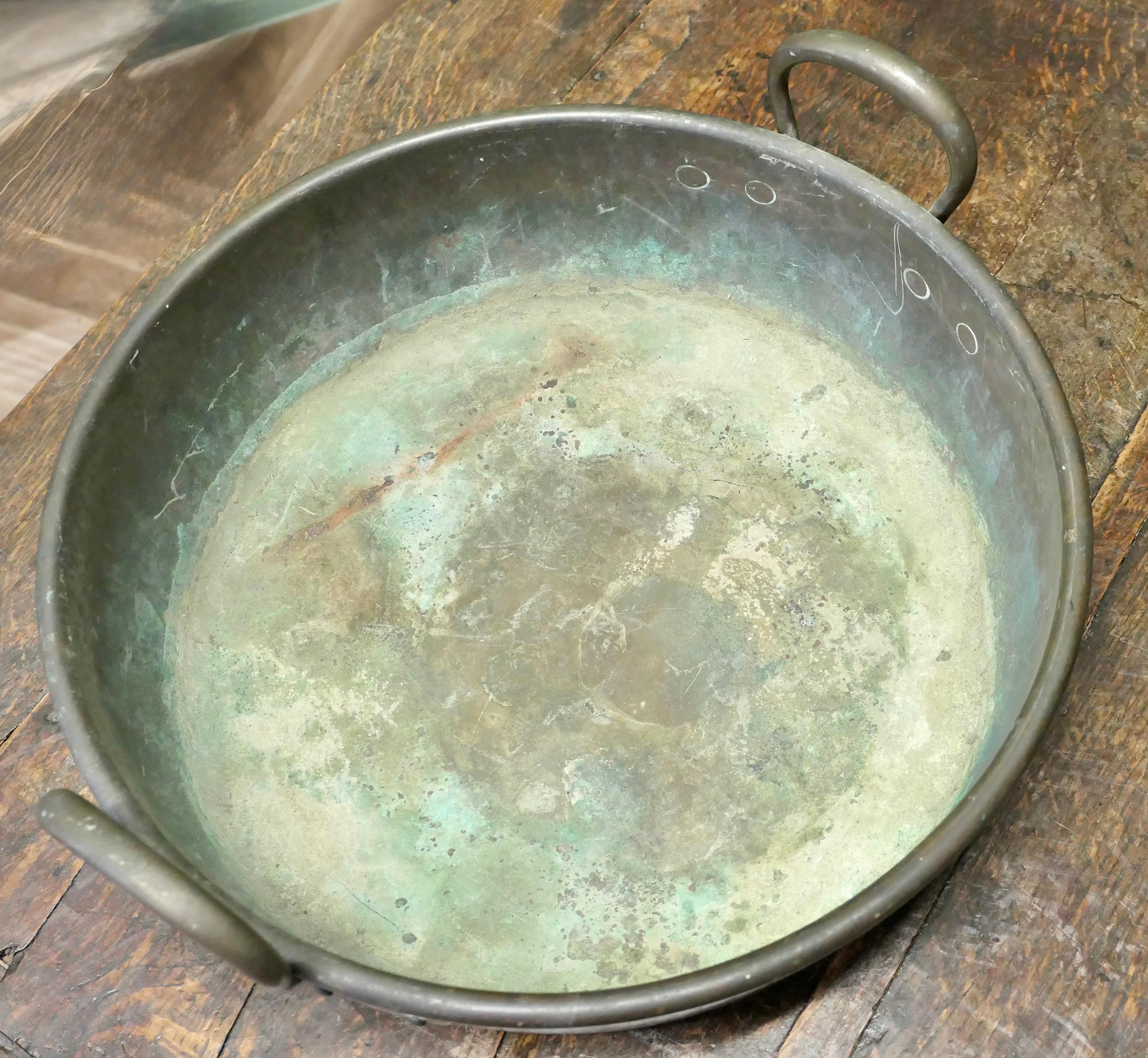 Heavy 19th Century Copper Preserving Pan  

This is a lovely looking preserving Pan, the pan has riveted handles and high sides with a flat bottom
The Pan is in good sound condition with  charming patination, a piece loved so much that the owner has