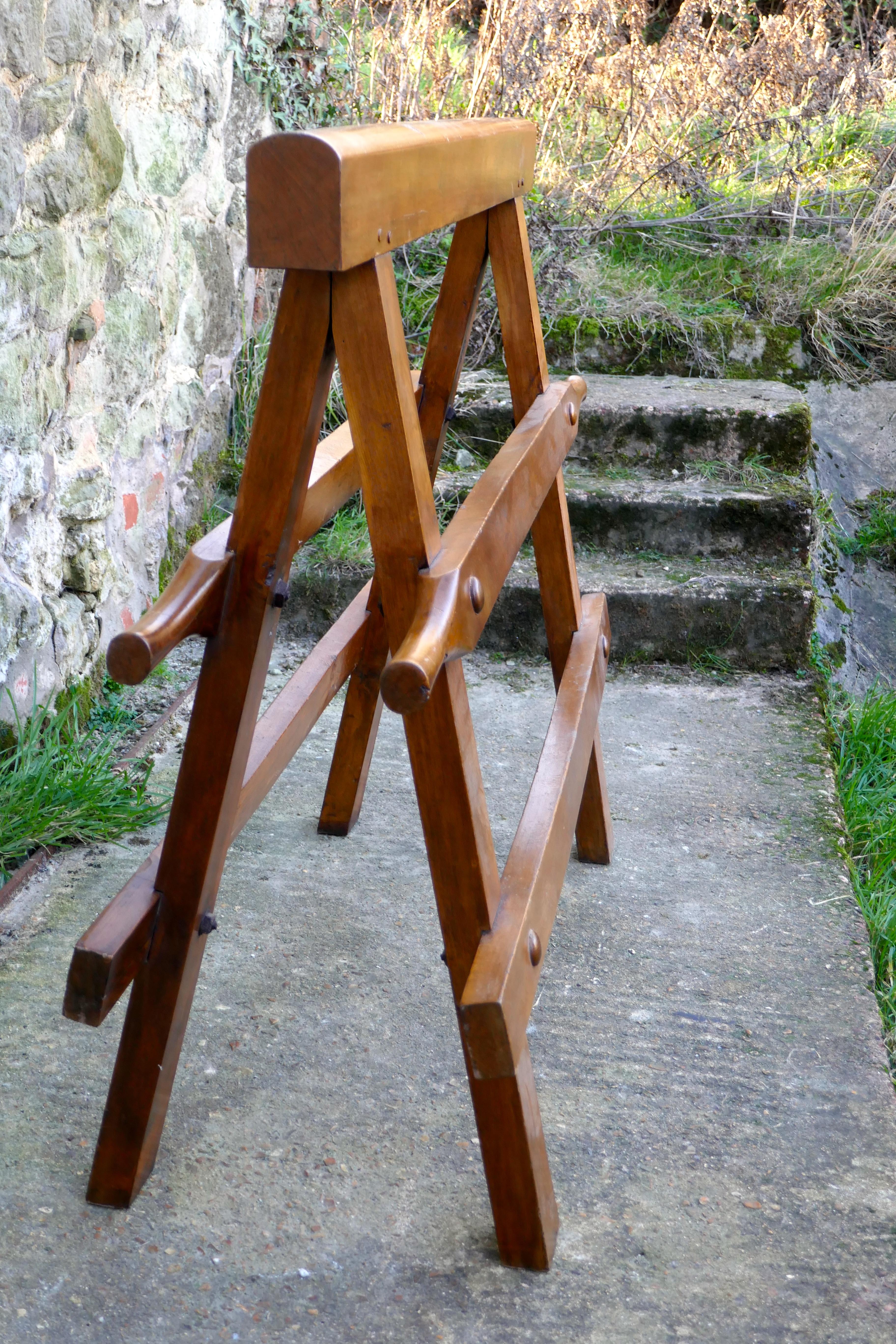Heavy 19th century saddle rack

The saddle stand or rack is all in original finish, it has extended centre rails which can be used to lift the heavy rack, a good stable piece as a saddle rack or perhaps it would work very well as an unusual