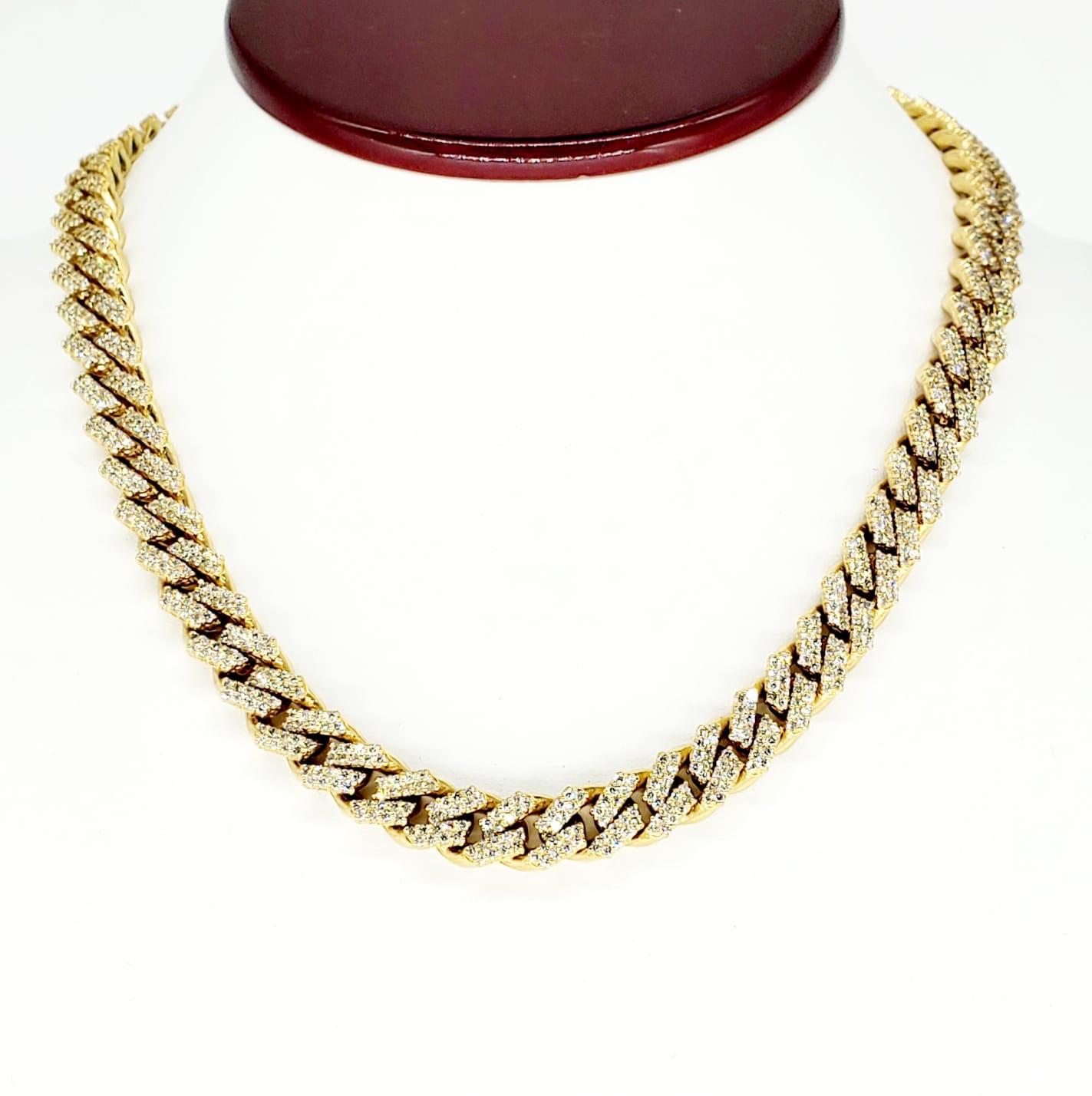 Modern 24 Carat Diamonds 9.4mm Cuban Link Choker Chain. This handmade Miami Cuban link chain features 1207 diamonds totaling approx weight 24 carats. The chain is 17 inches long and weights 113.5 grams and 10k solid gold. The Diamonds setting is
