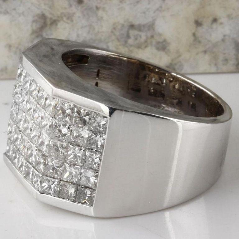 Heavy 5.65 Carats Natural Diamond 14K Solid White Gold Men's Ring

Amazing looking piece!

Total Natural Princess Cut Diamonds Weight: 5.65 Carats (color G-H / Clarity VS1)

Width of the ring: 15.08mm

Ring Weights: 23.3 grams

Disclaimer: all