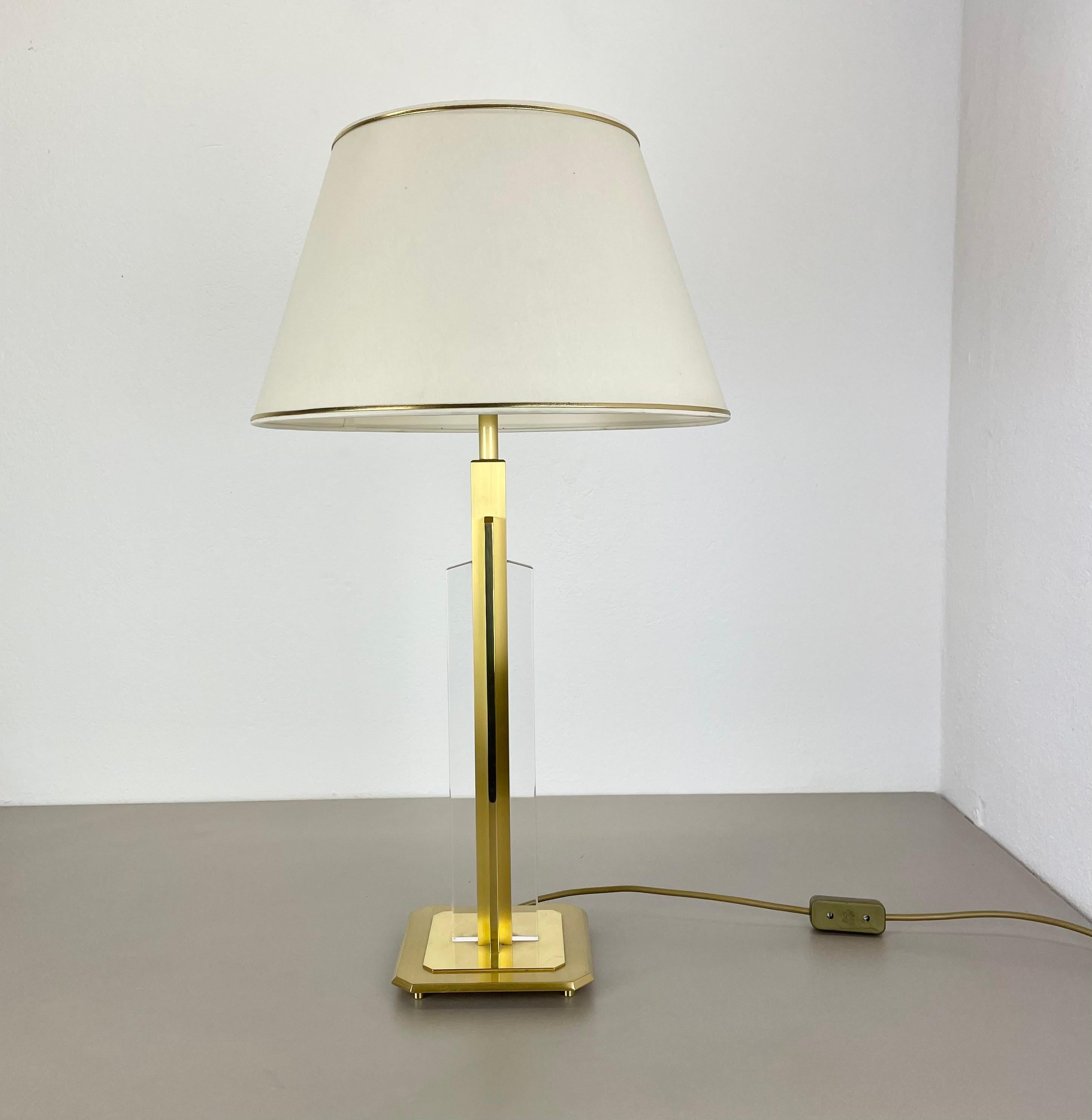 Article:

modernist brass table light


Origin:

ITALY


Decade:

1970s



This original vintage light was designed and produced in the 1970s in Germany by ITALY. The light is made of brass and and plexiglass elements on the sides, which gives the