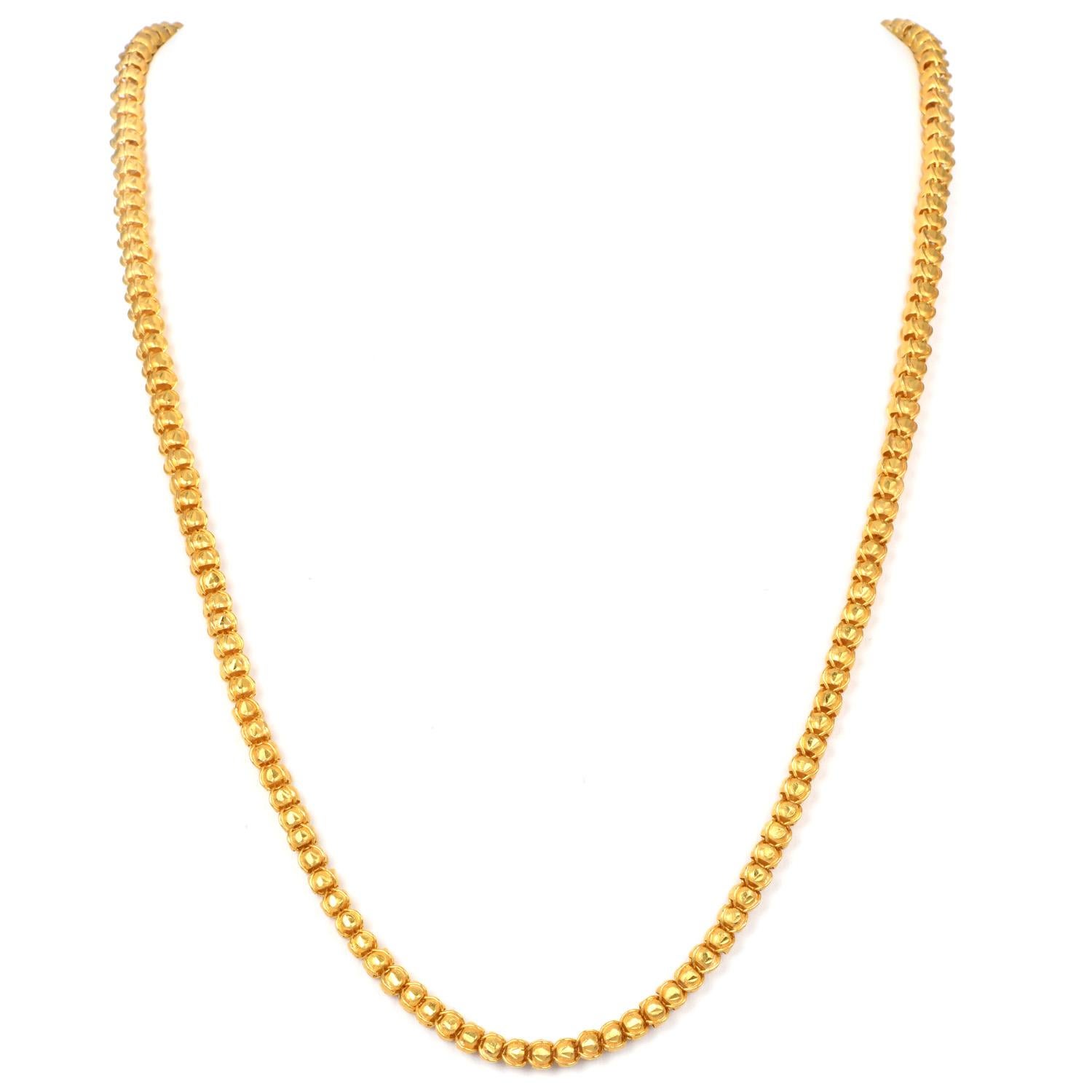 Featuring a vintage necklace is a masterpiece of high karat gold craftsmanship, exquisitely designed in 22K gold.

It features intricate engravings with a combination of gorgeous satin finishes and handcrafted filigree details.
From the hook to the
