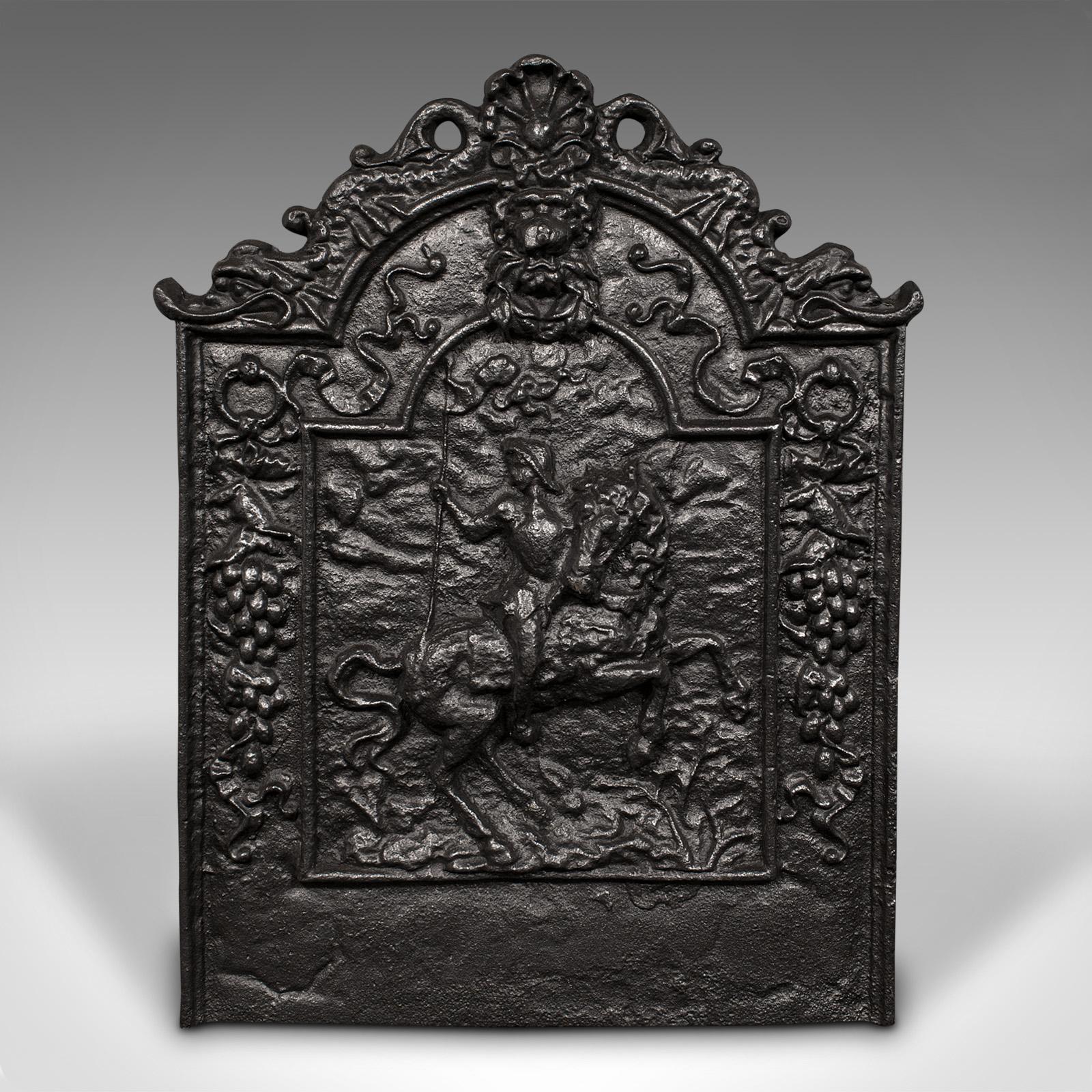 This is a heavy antique decorative fire back. An English, cast iron fireplace reflector with Lion Rampant relief, dating to the Georgian period, circa 1800.

Superb relief decor accentuates this substantial fire back
Displays a desirable aged patina