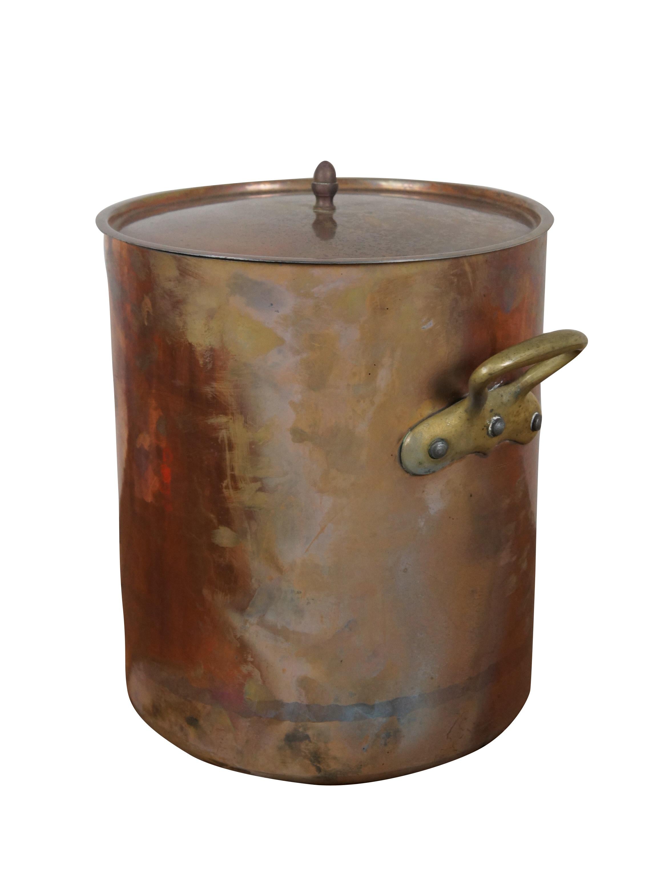 A very large and heavy antique French copper stock pot / cauldron / boiler featuring copper body with bronze handles and acorn finial lid.

DIMENSIONS:
11.5