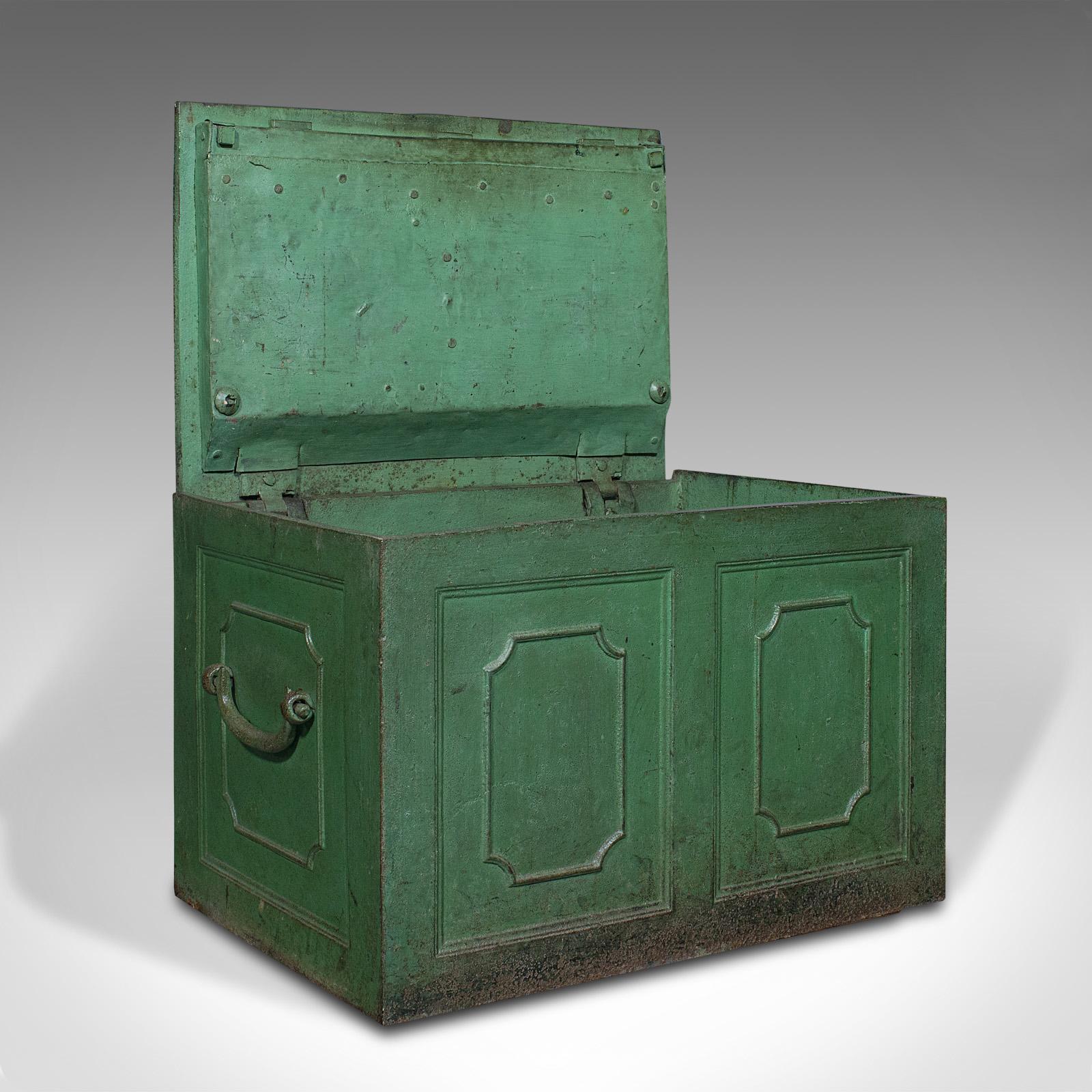 This is a heavy antique merchant's strongbox. An English, cast iron safe deposit case, dating to the Georgian period, circa 1800.

Superb antique vault of impressive weight 
Displays a desirable aged patina throughout
Cast iron resplendent in a