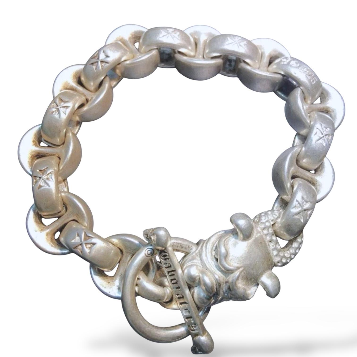 Elevate your accessory game with our striking Sterling Silver Bull Head Chain Bracelet, a perfect blend of rugged elegance and bold style. Crafted from high-quality sterling silver, this heavy bracelet features a thick biker-style chain that exudes