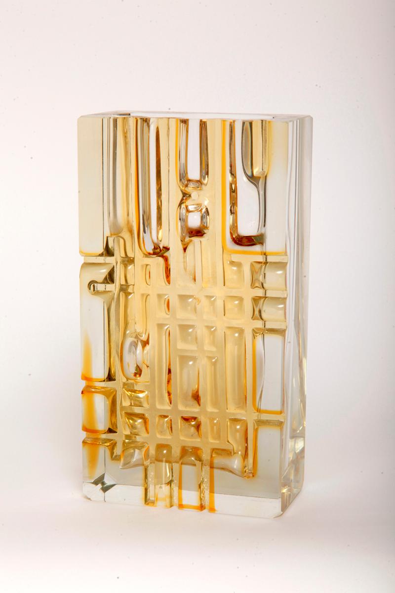 A heavy Bohemian midcentury vase of honey-colored glass; by Moser Glassworks.
On the edge of the description 