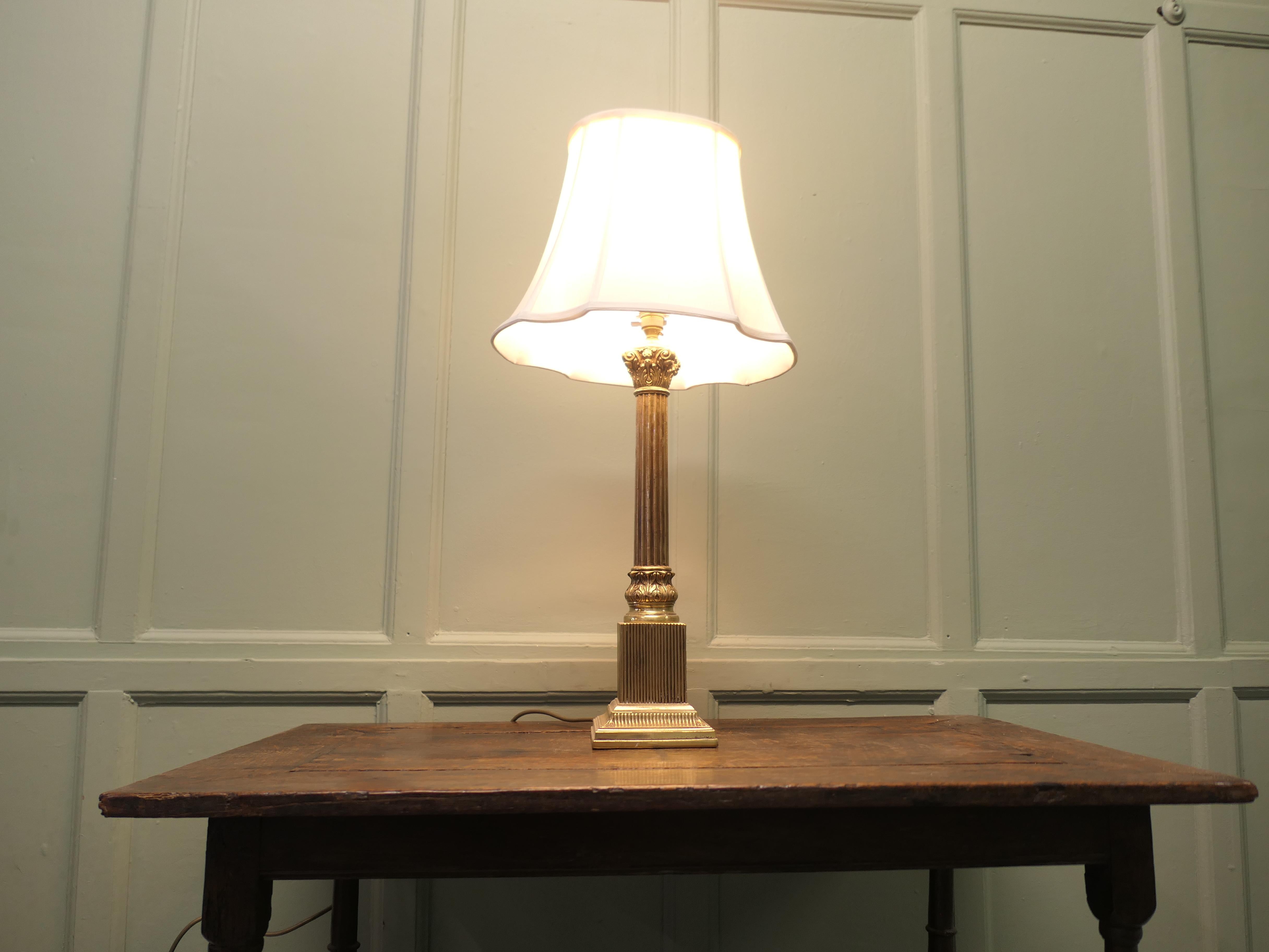 Heavy Brass Corinthian Column Table Lamp

This is a very attractive piece, the lamp has a single fluted column set on a very attractive fluted stepped base 
This is an attractive piece with a good patina, the wiring is all good and it come with a