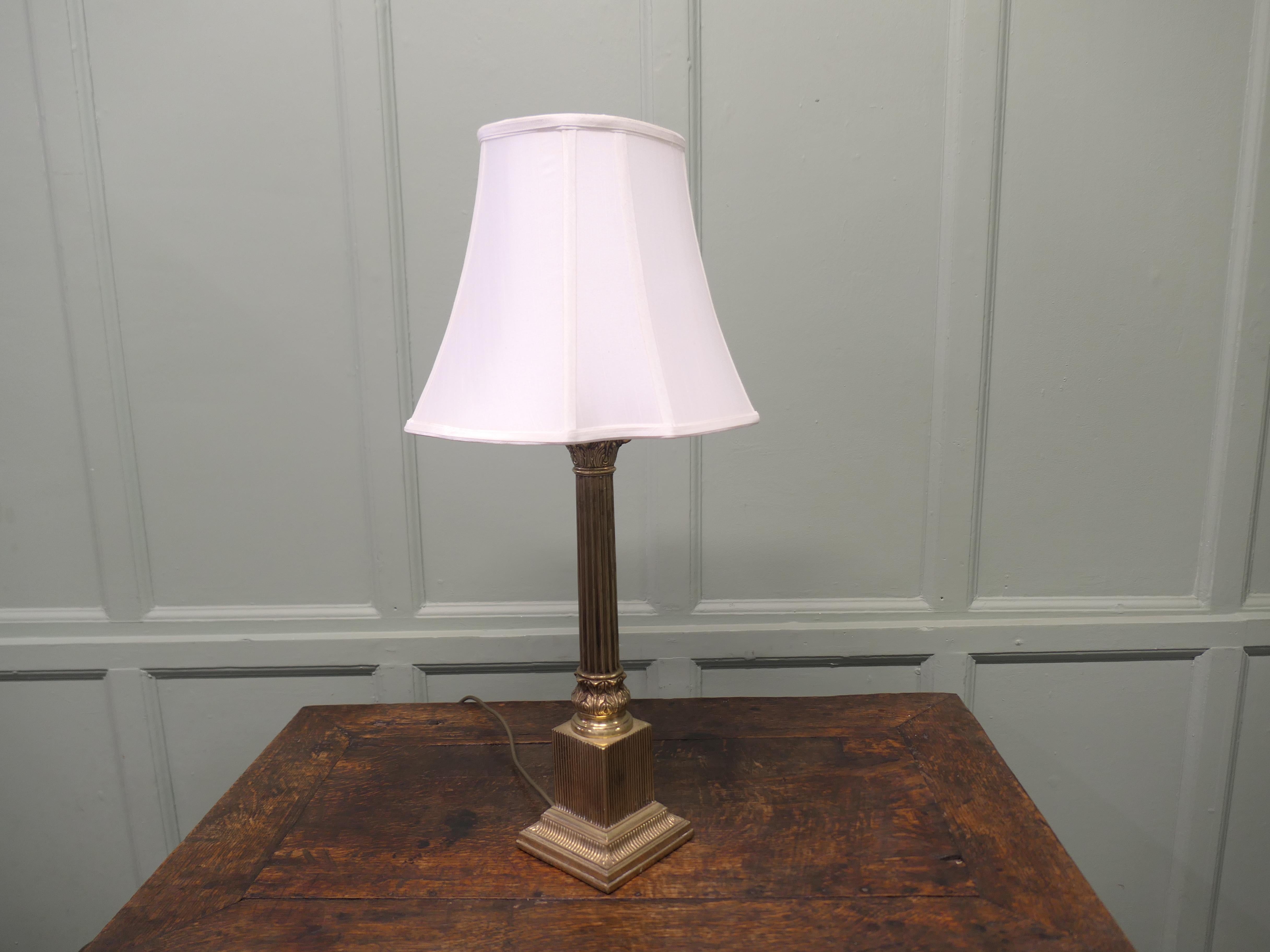 Mid-Century Modern Heavy Brass Corinthian Column Table Lamp  This is a very attractive piece For Sale