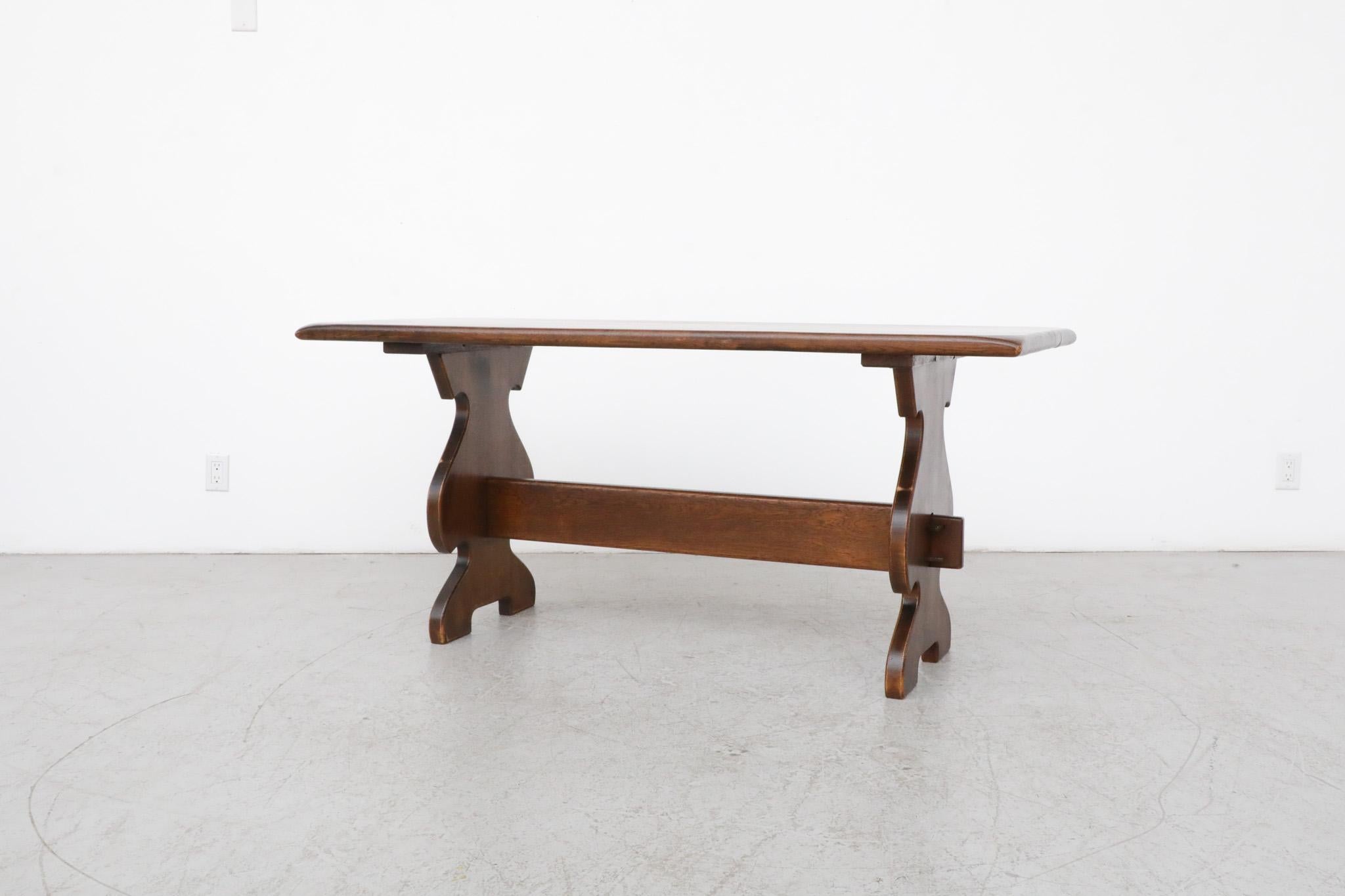 Mid-Century Modern Heavy Brutalist Solid Dark Oak Trestle Table with Ornate Base For Sale