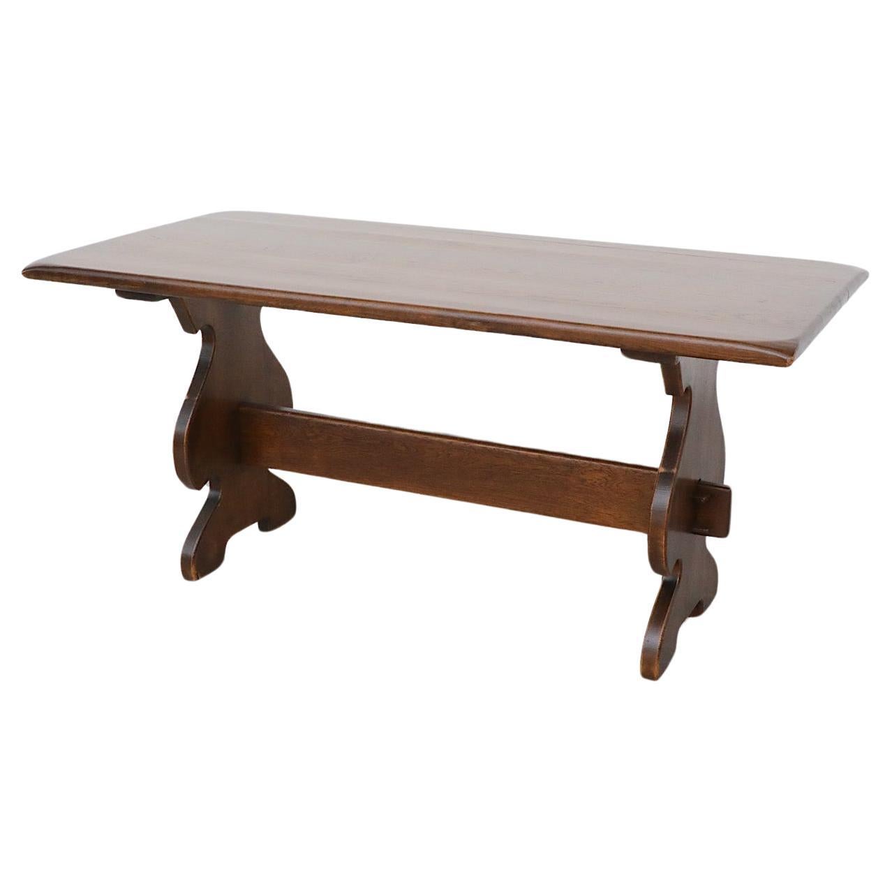 Heavy Brutalist Solid Dark Oak Trestle Table with Ornate Base For Sale