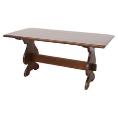Vintage Heavy Brutalist Solid Dark Oak Trestle Table with Ornate Base