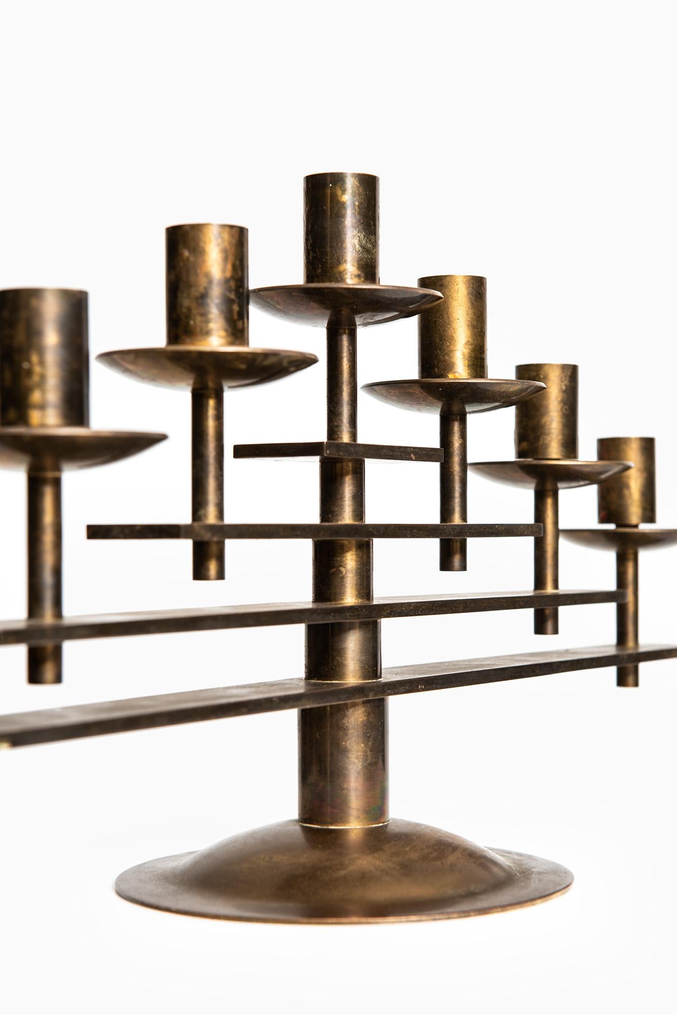 Heavy candlestick in brass produced in Denmark In Good Condition For Sale In Limhamn, Skåne län