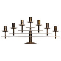 Heavy candlestick in brass produced in Denmark