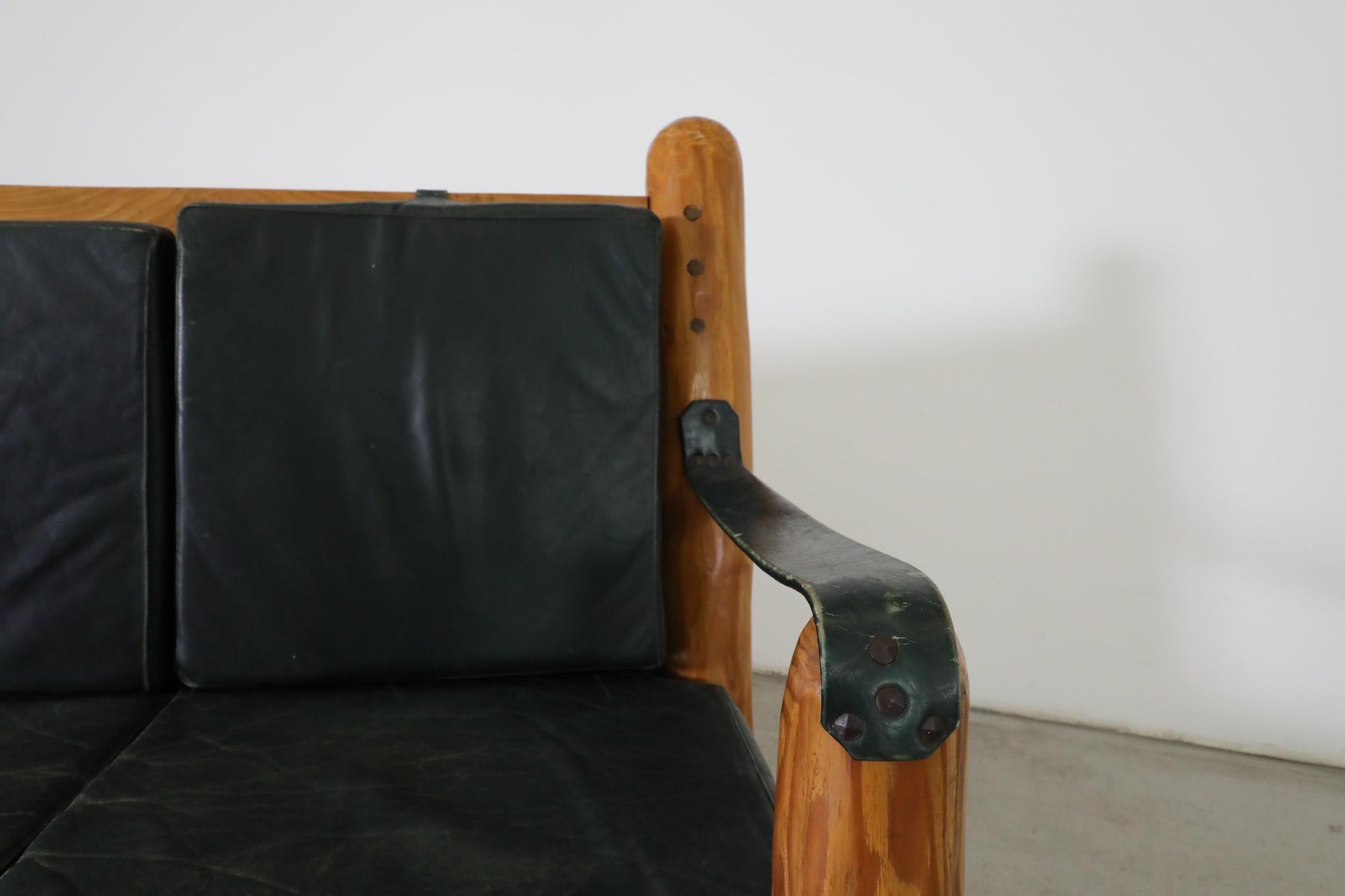 Heavy Carved Pine and Green Leather Loveseat with Sling Arms & High Slatted Back For Sale 11