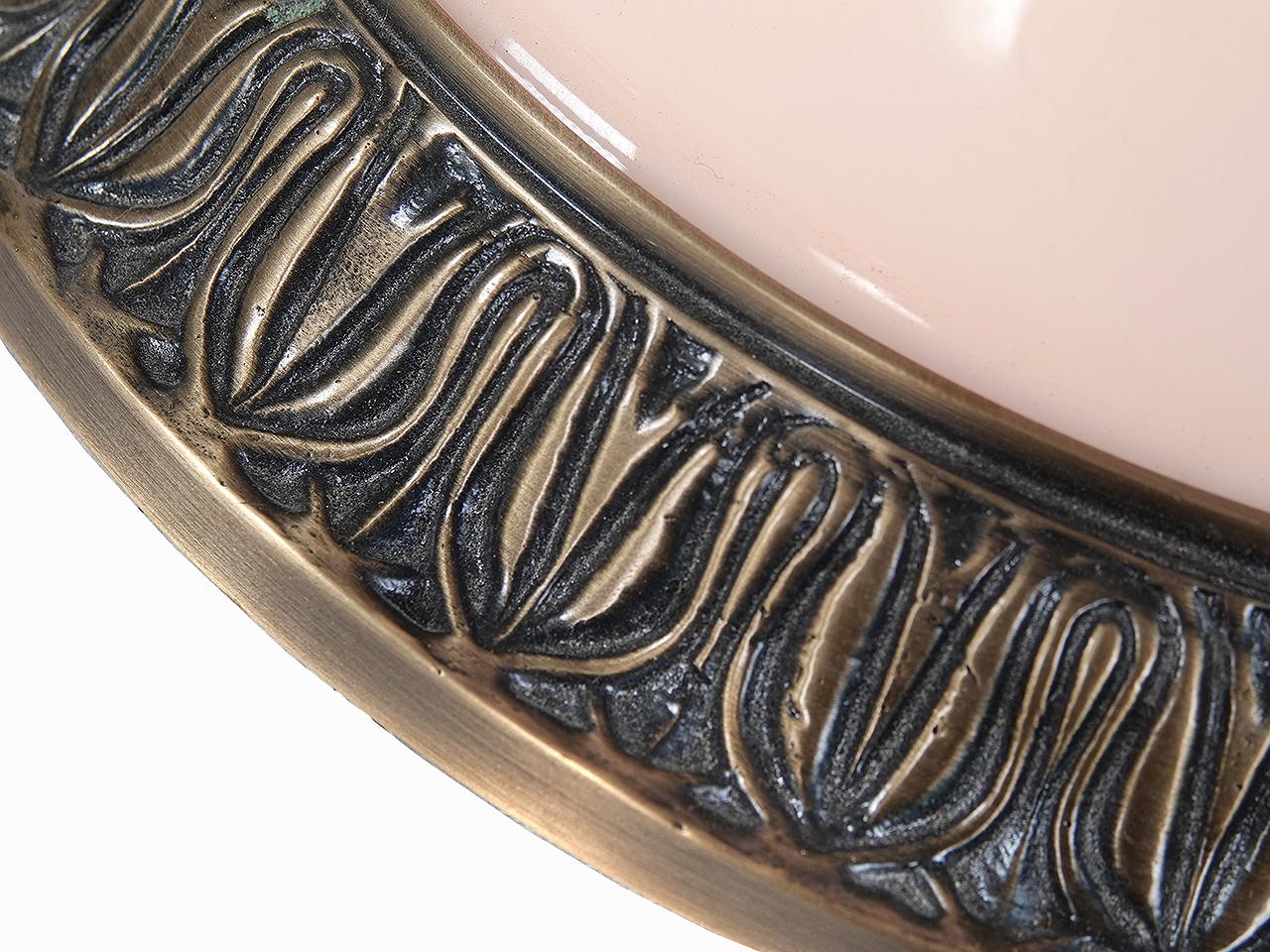 We found this high quality flush mount that was produced in New York by Urban Archaeology. In fact they are still listed in their catalog as an Acanthus Flushmount in Antique Brass. I was surprised to see their per lamp $1365 list price. These are