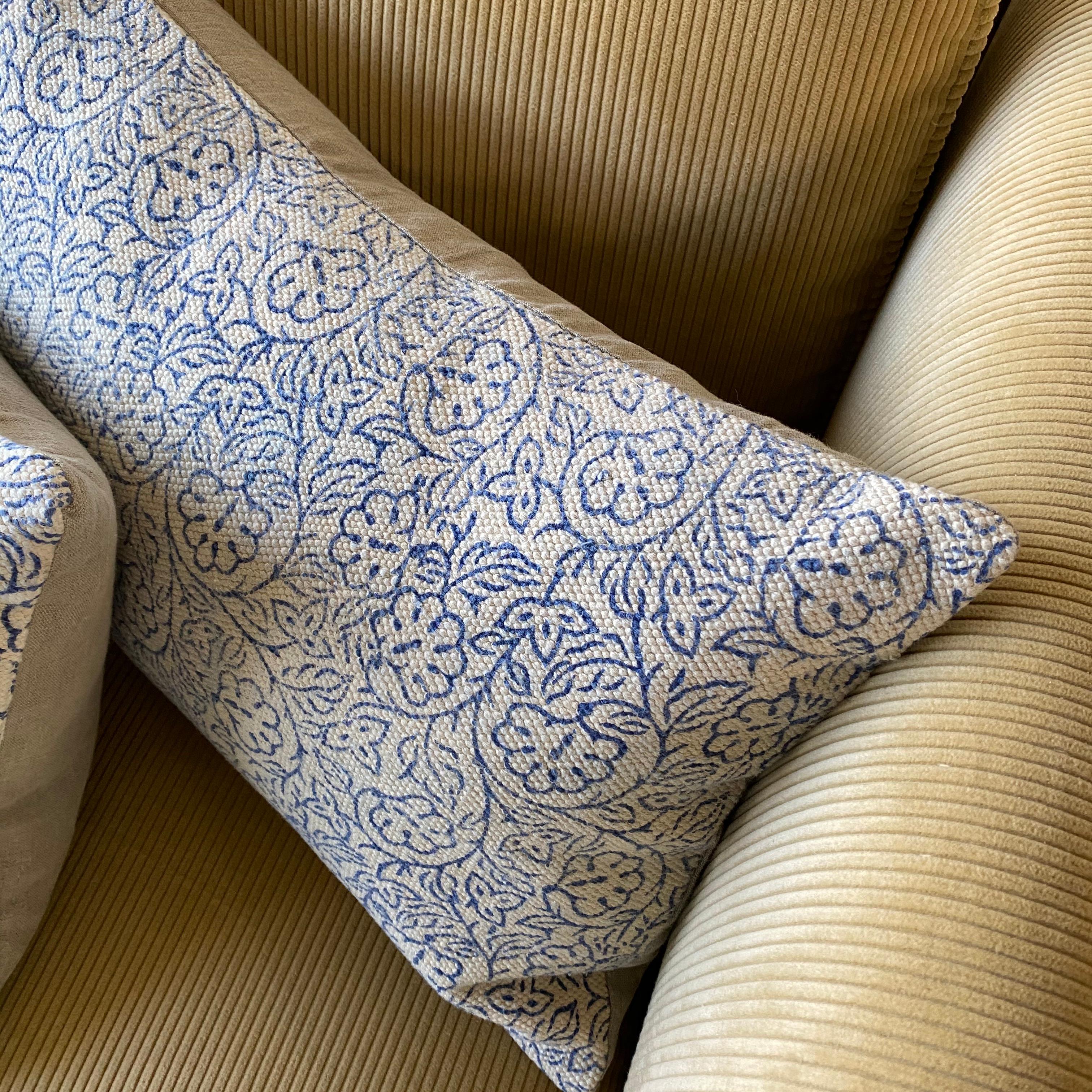 Heavy cream and blue floral linen pillow made from a vintage textile. Feather and down insert.