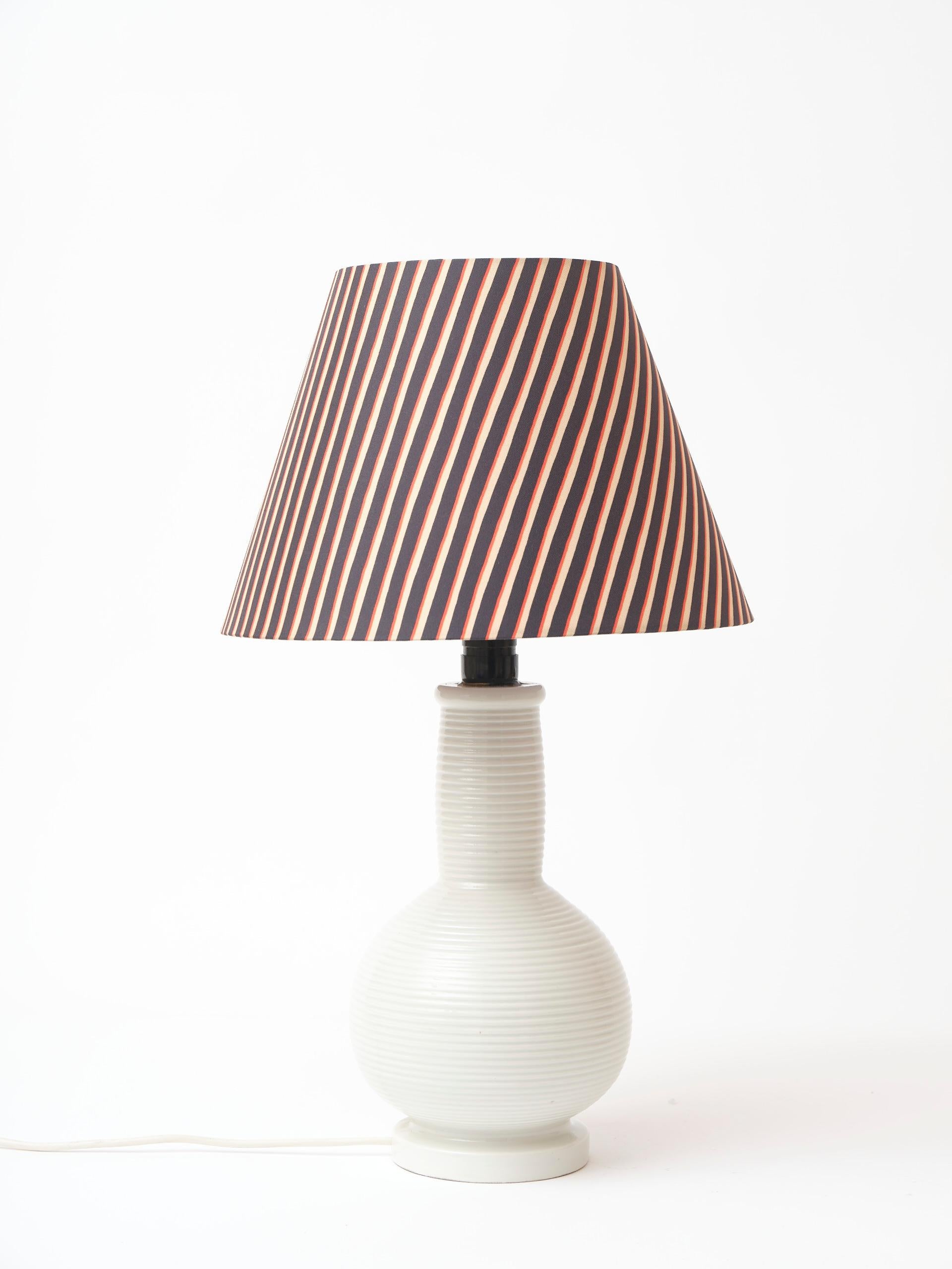 Glazed Heavy Danish midcentury table lamp in white rifled porcelain For Sale