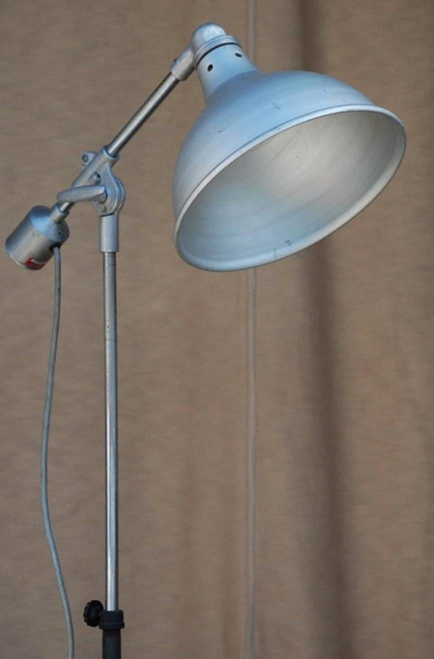 Heavy duty industrial task floor lamp. Great for a loft. Measure: 13 in. diameter reflector.