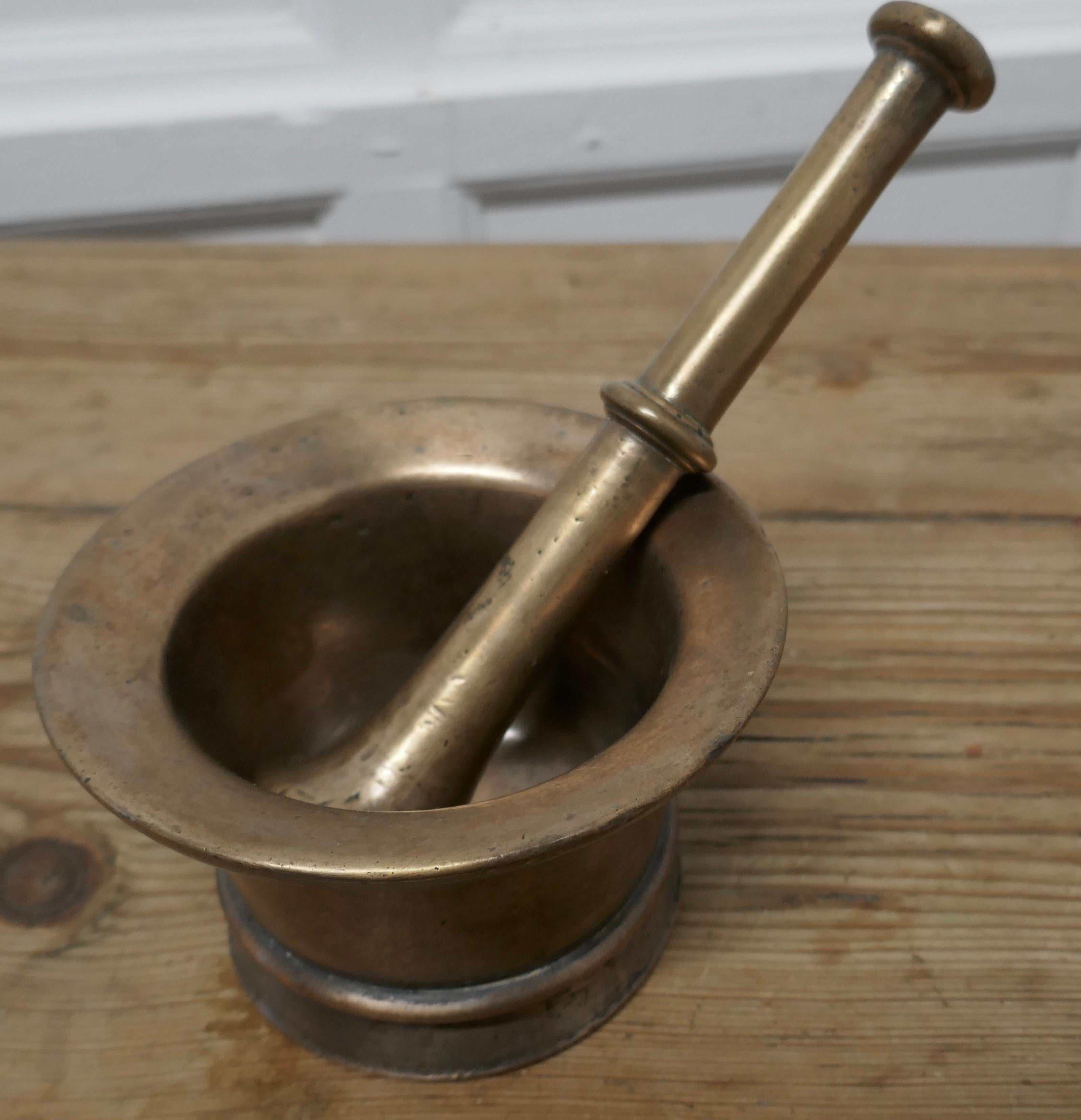 Heavy French bronze pestle and mortar 

A good pair and ready for your kitchen
The mortar is clean inside, this is a very heavy pair, in good used condition, a charming culinary piece
The mortar is 4” high and 5.5” in diameter, the pestle is 9”