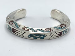 Bracelet en argent massif avec incrustation de copeaux par Ray Begay (Navajo)