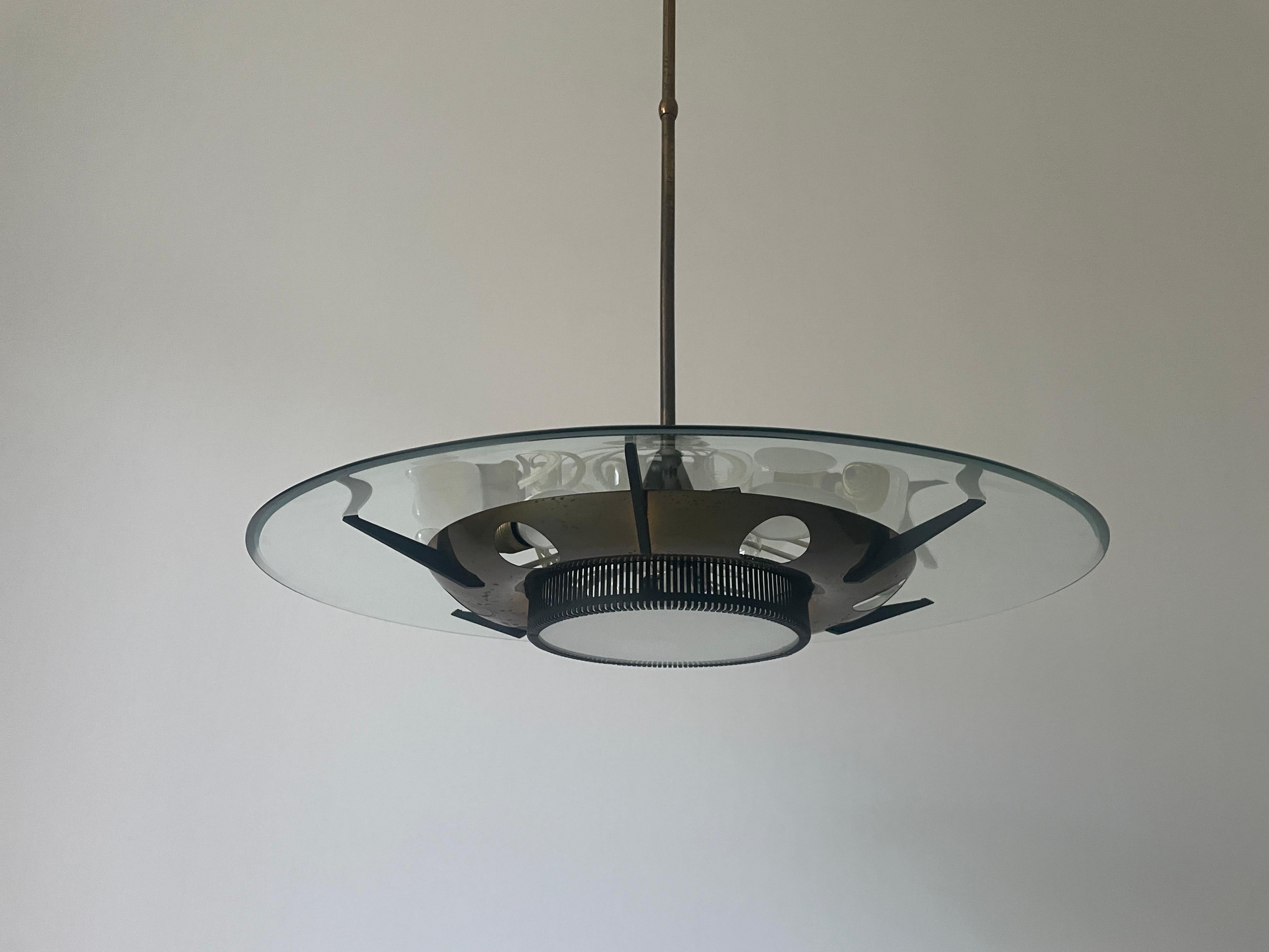 Heavy Glass and Brass Suspension Pendant Light by Stilnovo, 1950s, Italy

Lampshade is in very good vintage condition.

This lamp works with 8x E14 light bulbs. 
Wired and suitable to use with 220V and 110V for all countries.

Measurements:

Total