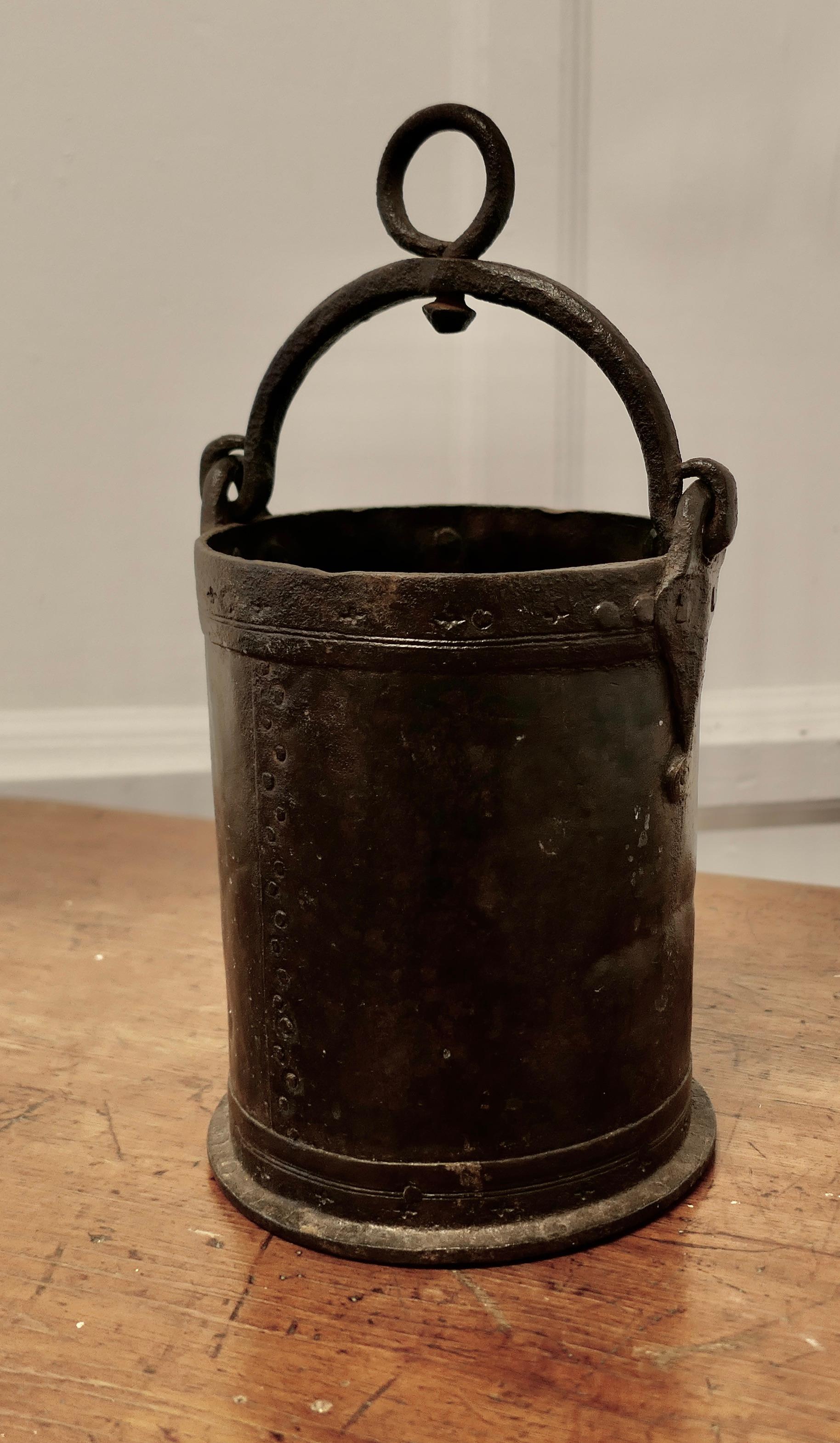 Heavy Iron Bucket.
This is a lovely small bucket, this charming piece has riveted construction and with a swing handle
The cauldron is in good well aged condition, it is 7” in diameter and 9” high not including the handle
MS178.