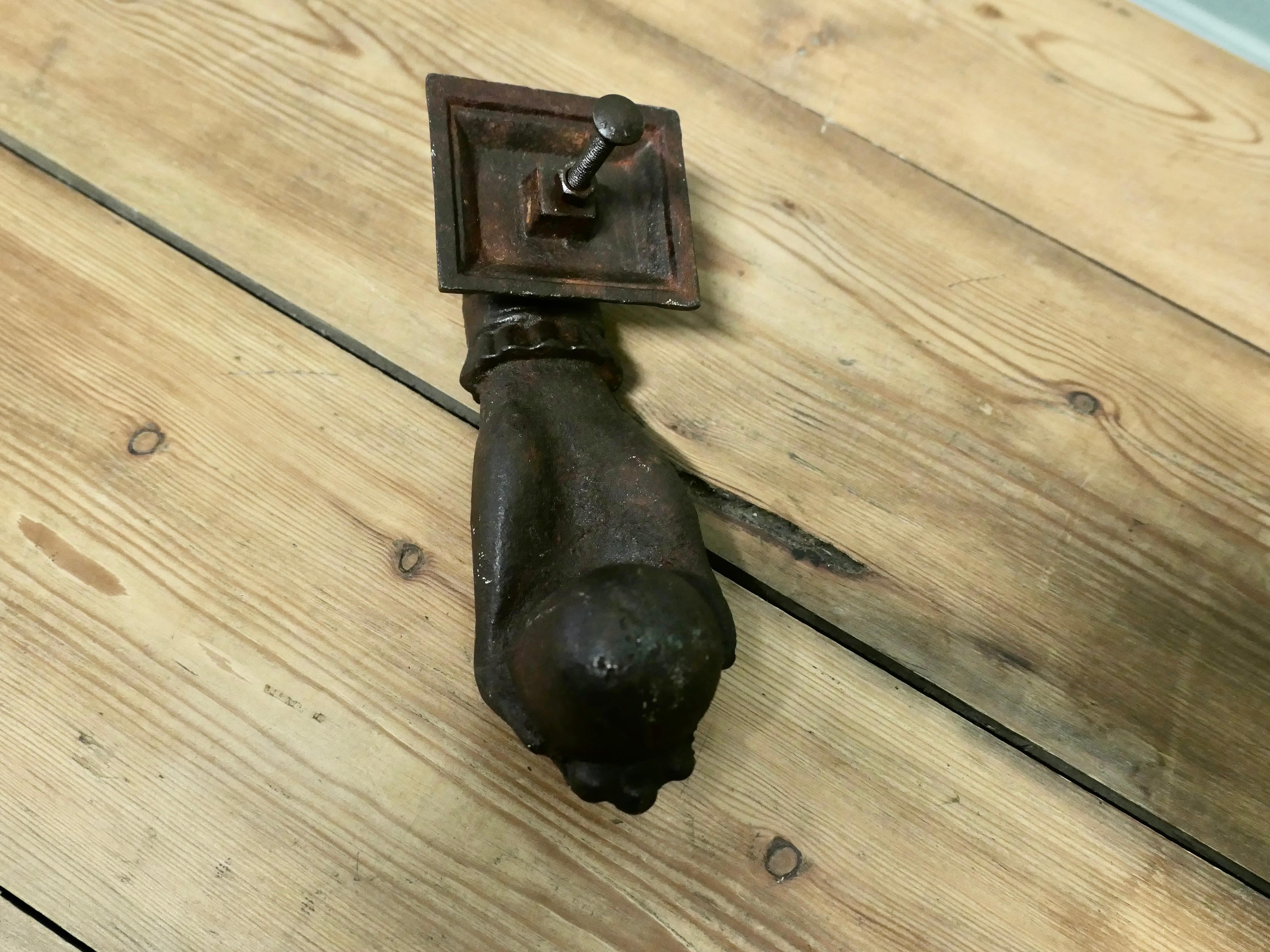 19th Century Heavy Iron Door Knocker, a Hand Knocking on the Door For Sale