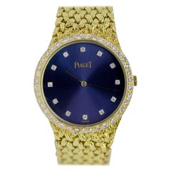 Montre-bracelet lourde pour femme Piaget en or jaune massif 18 carats avec diamants