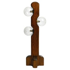 Heavy large 1960s floor lamp by Temde made of pine and with three glass balls