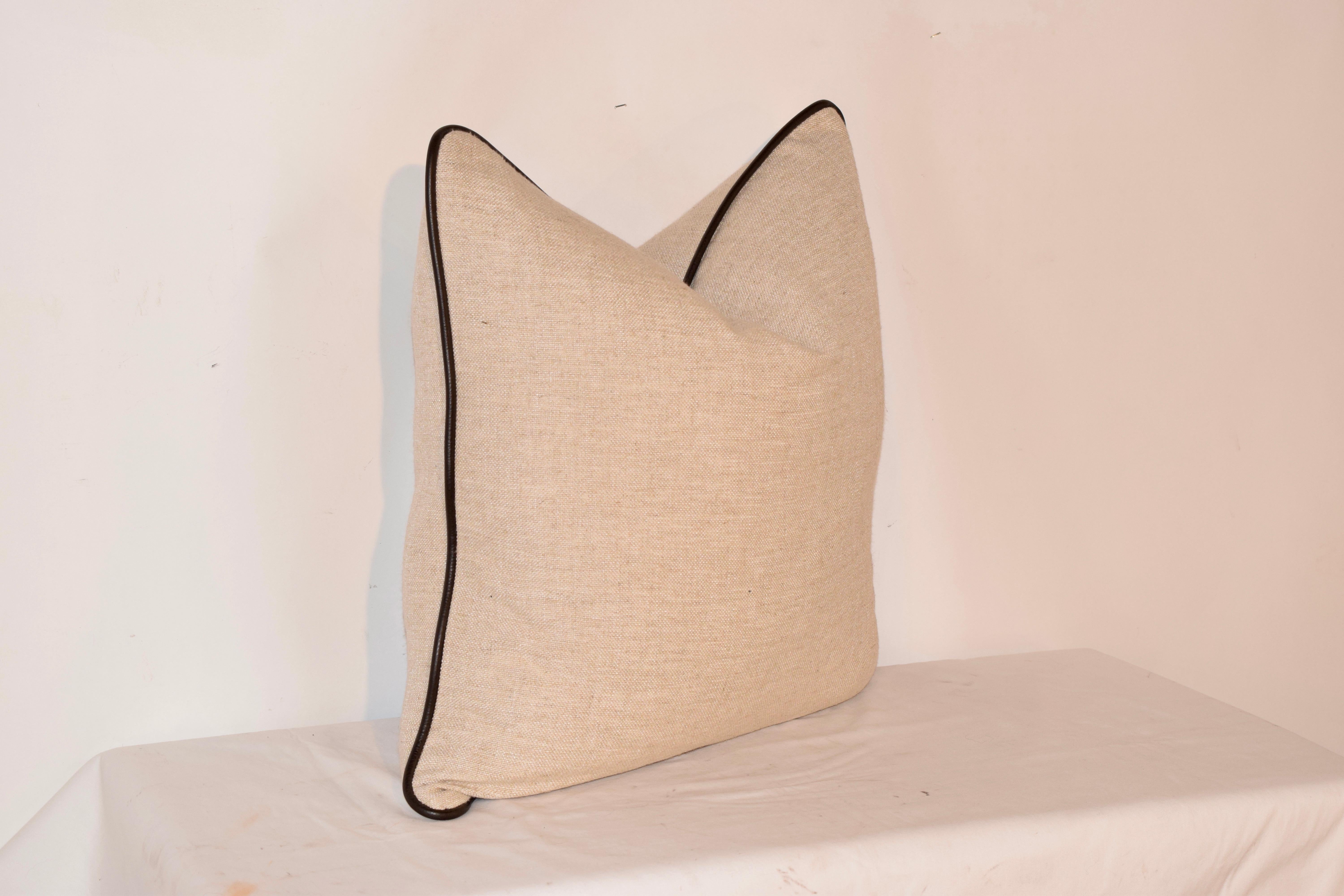 Hand made in North Carolina heavy flax linen pillow with Italian leather welting and dressmaker hidden zipper. Wonderful quality. 95/5 feather insert included.