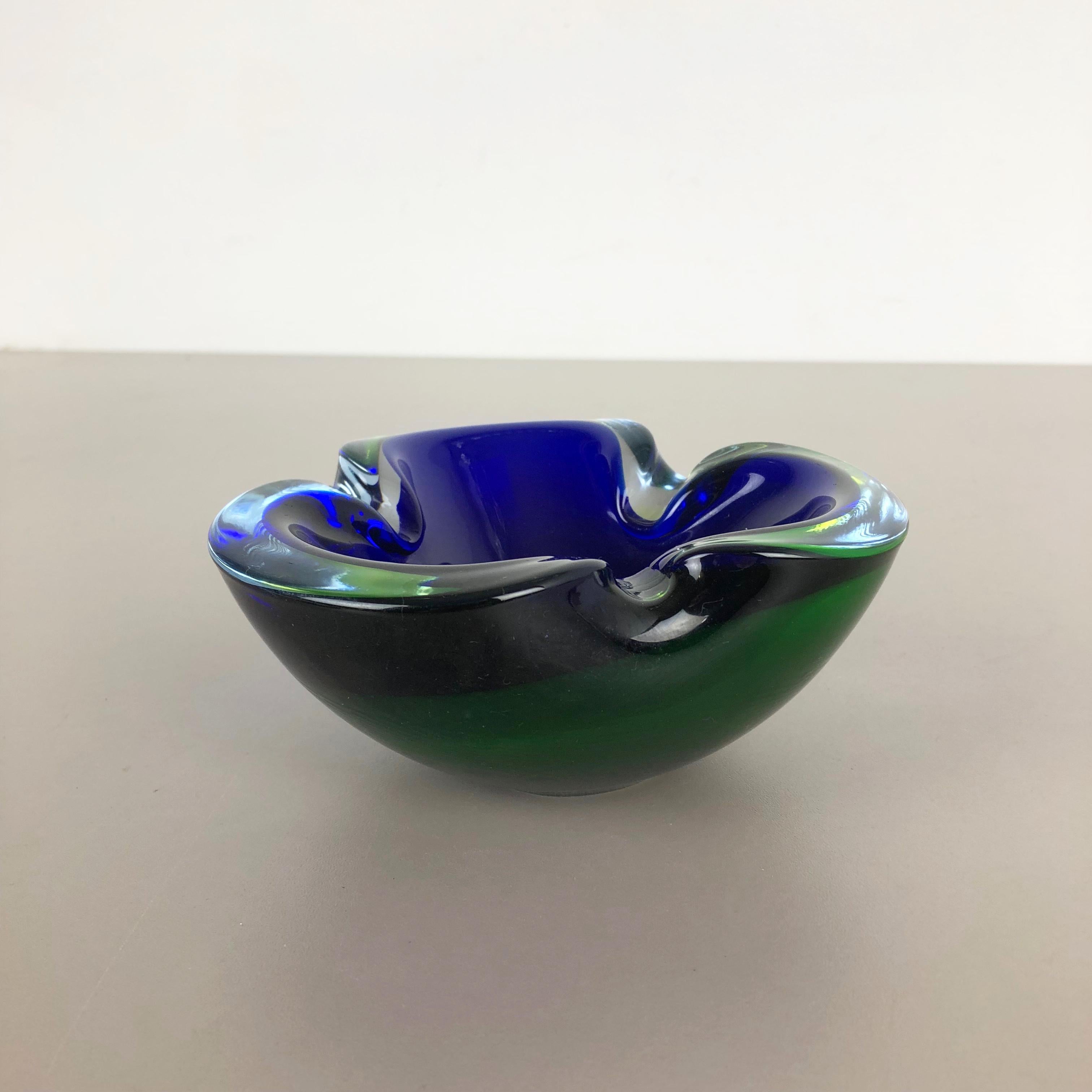 Article:

Murano glass bowl, ashtray element


Origin:

Murano, Italy


Decade:

1970s



This original vintage glass bowl element, ash tray was produced in the 1970s in Murano, Italy. It is made in Murano technique and has a