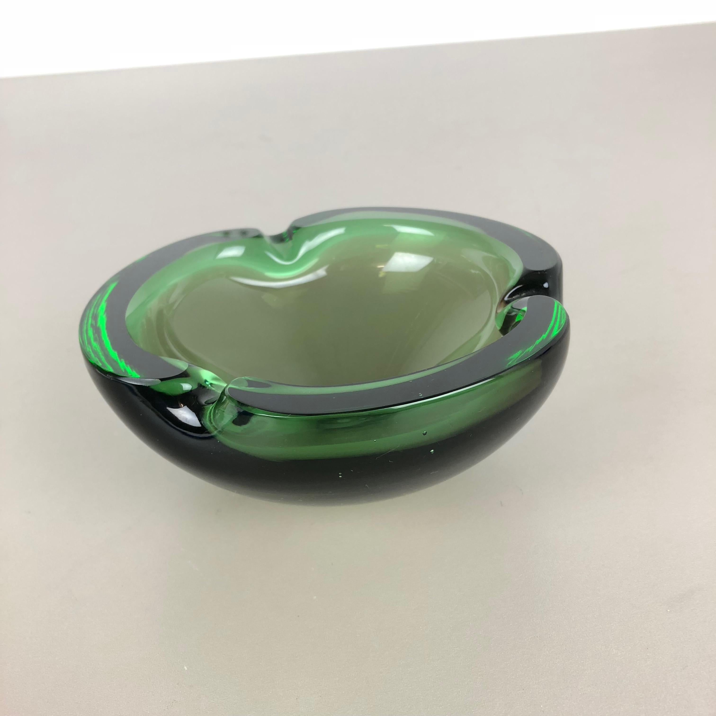 Article:

Murano glass bowl, ashtray element


Origin:

Murano, Italy


Decade:

1970s



This original vintage glass bowl element, ash tray was produced in the 1970s in Murano, Italy. It is made in Murano technique and has a