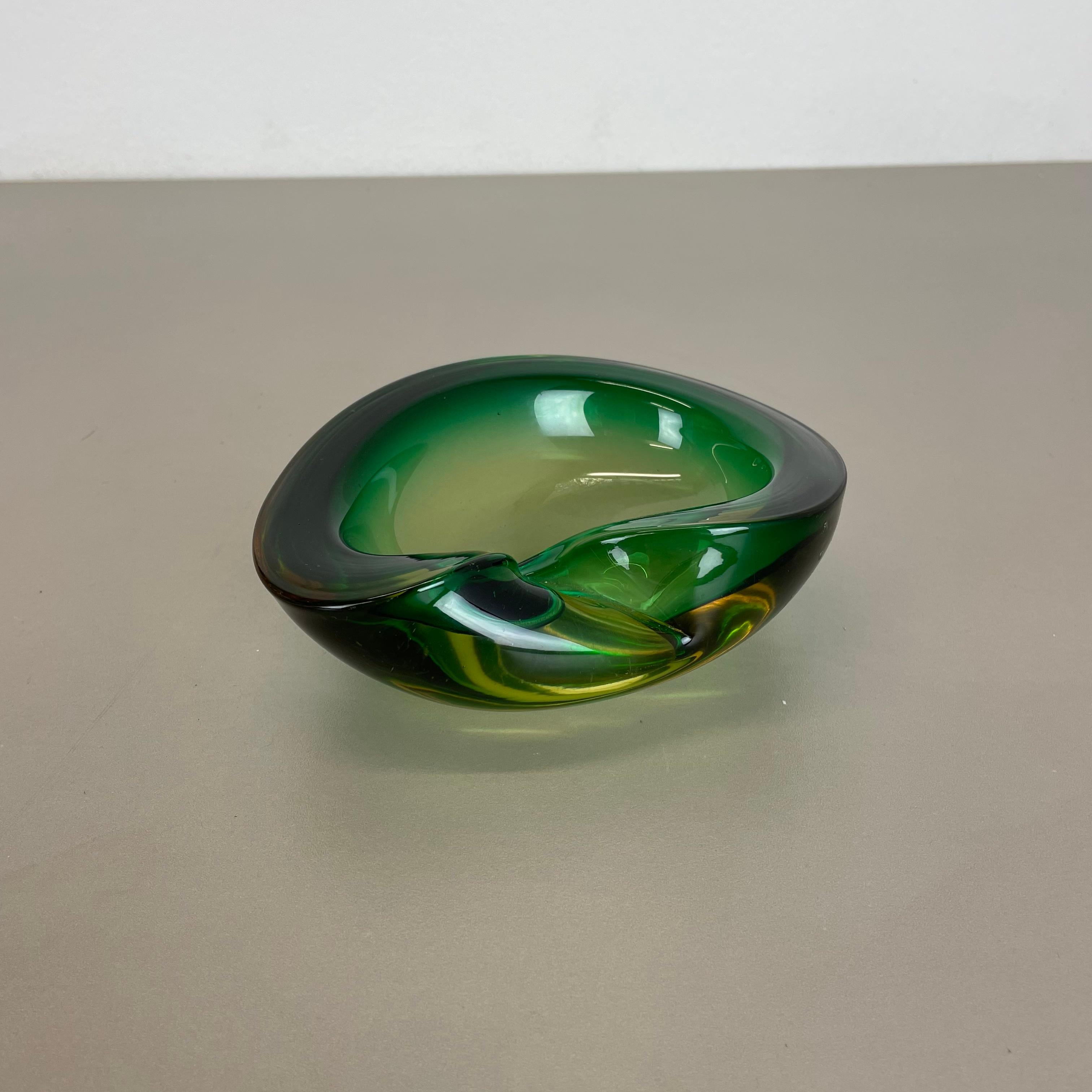 Article:

murano glass bowl, ashtray element.


Origin:

Murano, Italy.


Decade:

1970s.



This original vintage glass bowl element, ash tray was produced in the 1970s in Murano, Italy. It is made in Murano technique and has a fantastic form. The