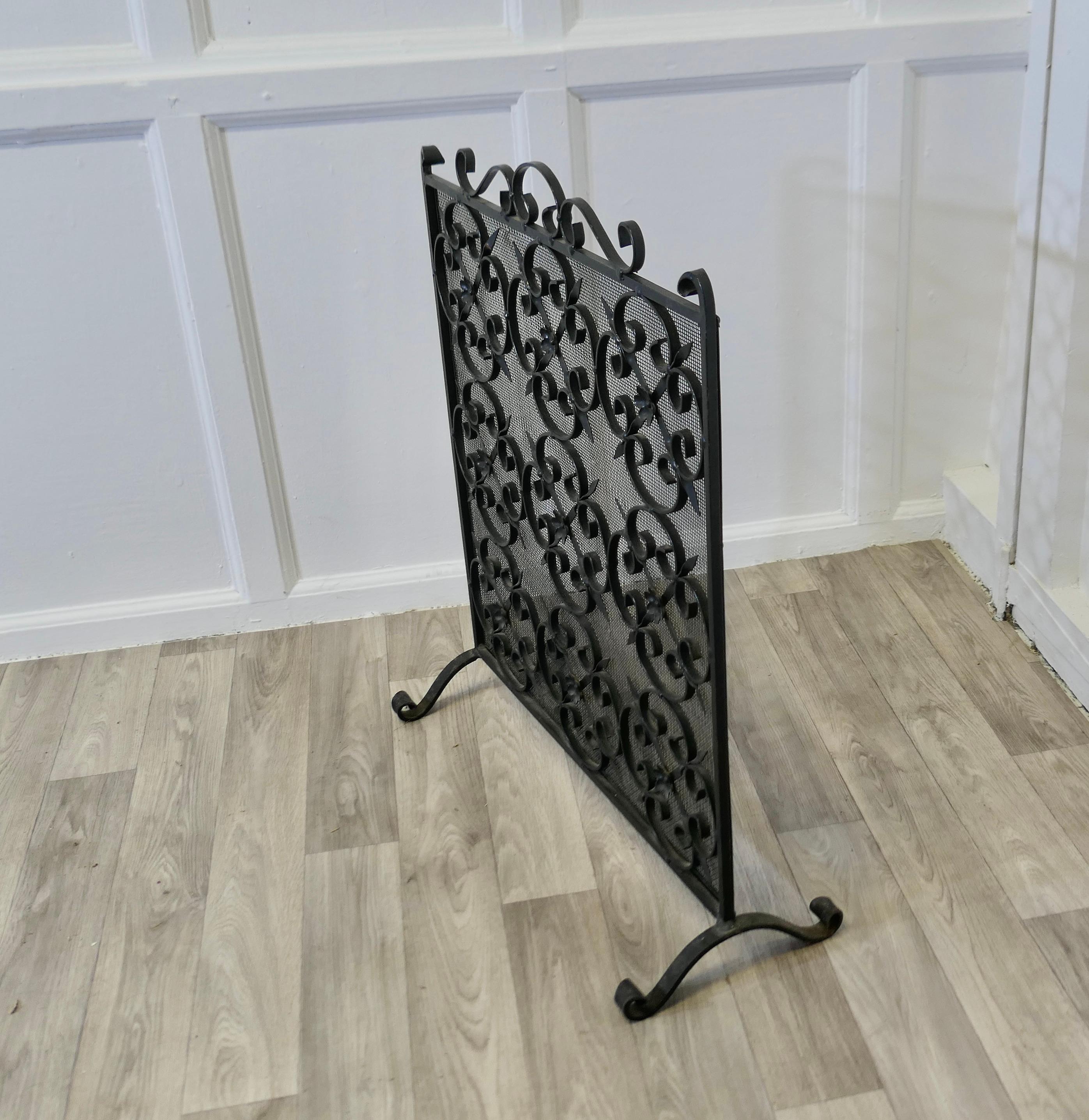 Late 19th Century Heavy Old Gothic Wrought Iron Fire Screen  This is a very attractive piece