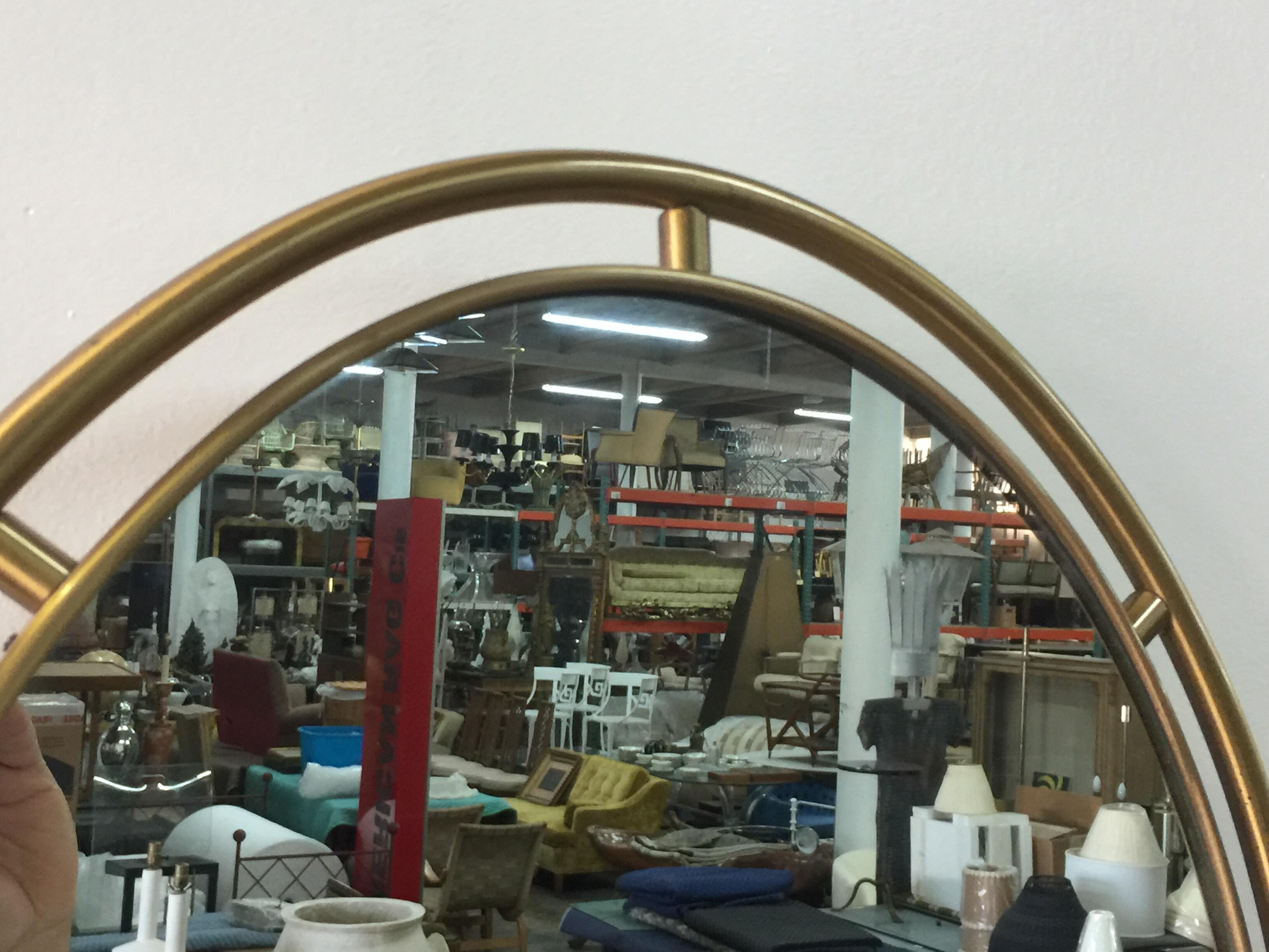 oval brass mirror
