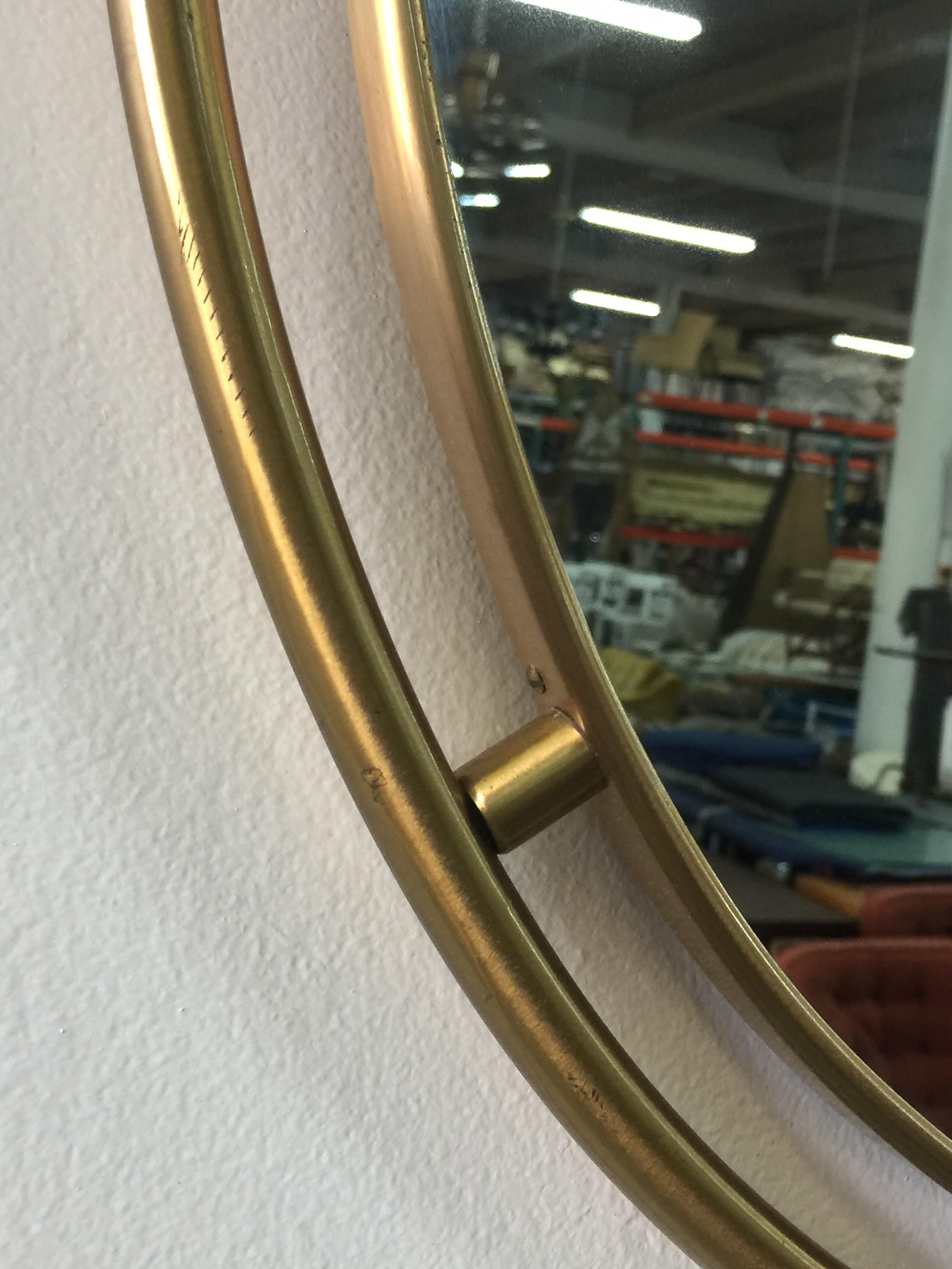 Italian Heavy Oval Floating Brass Framed Mirror For Sale