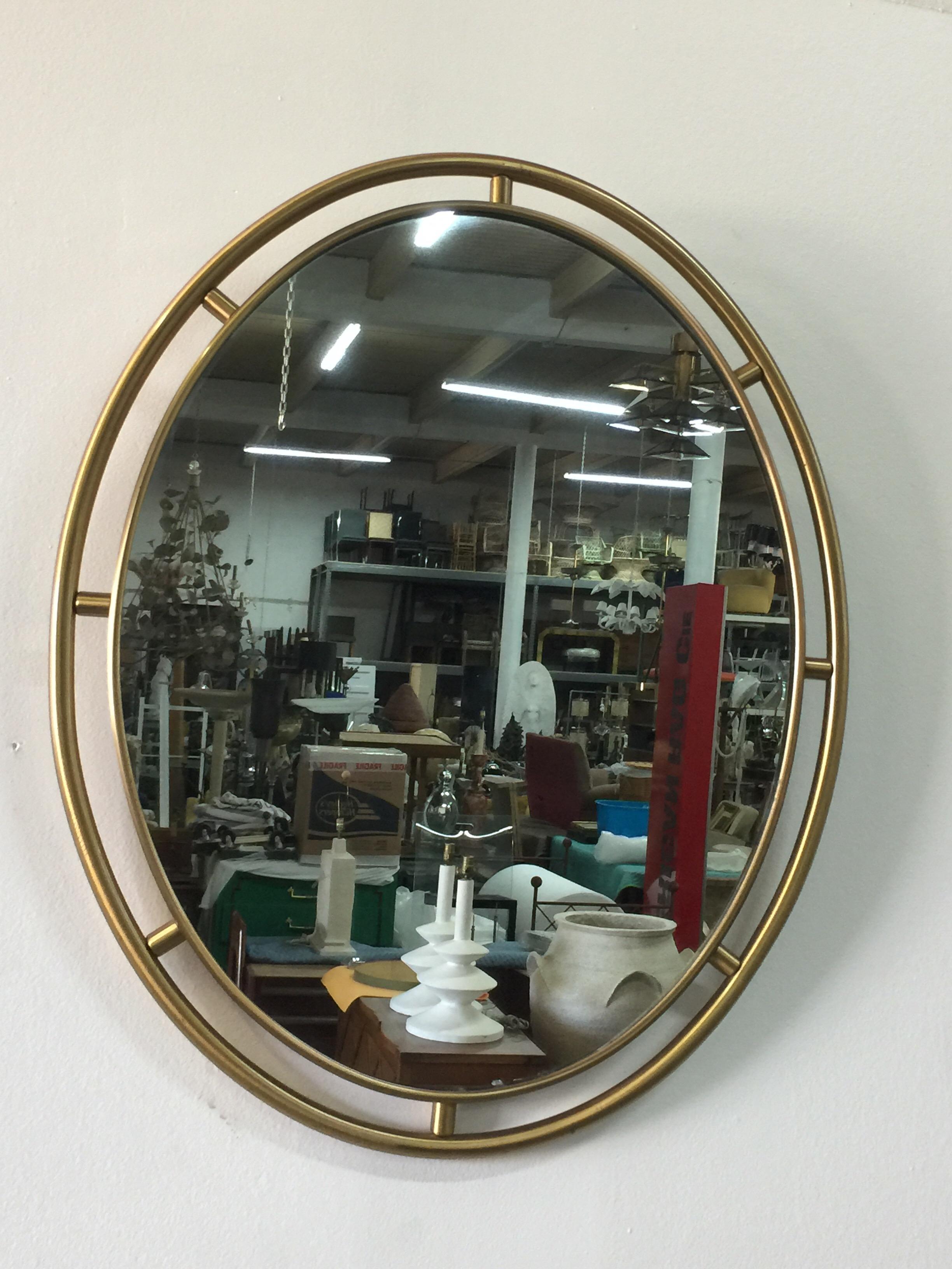 Heavy Oval Floating Brass Framed Mirror In Good Condition For Sale In East Hampton, NY