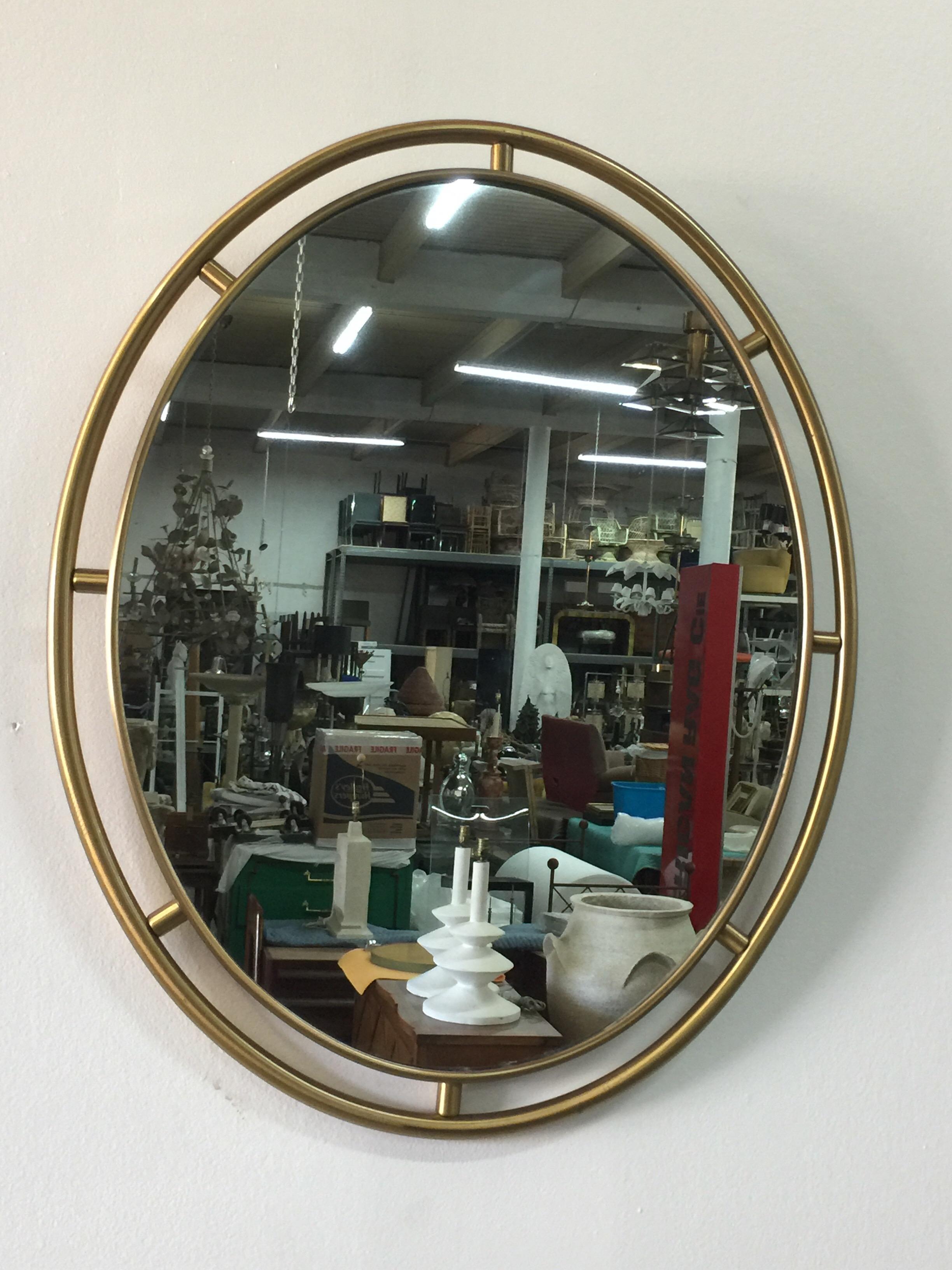 Late 20th Century Heavy Oval Floating Brass Framed Mirror For Sale