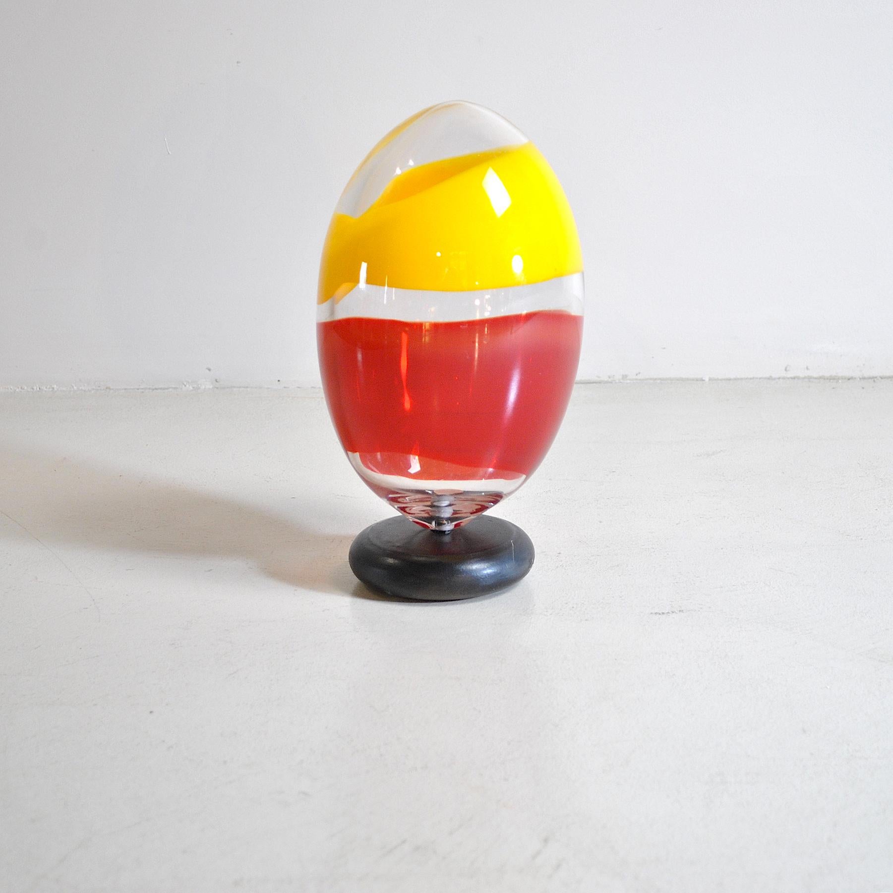 1960s solid glass egg-shaped paperweight.